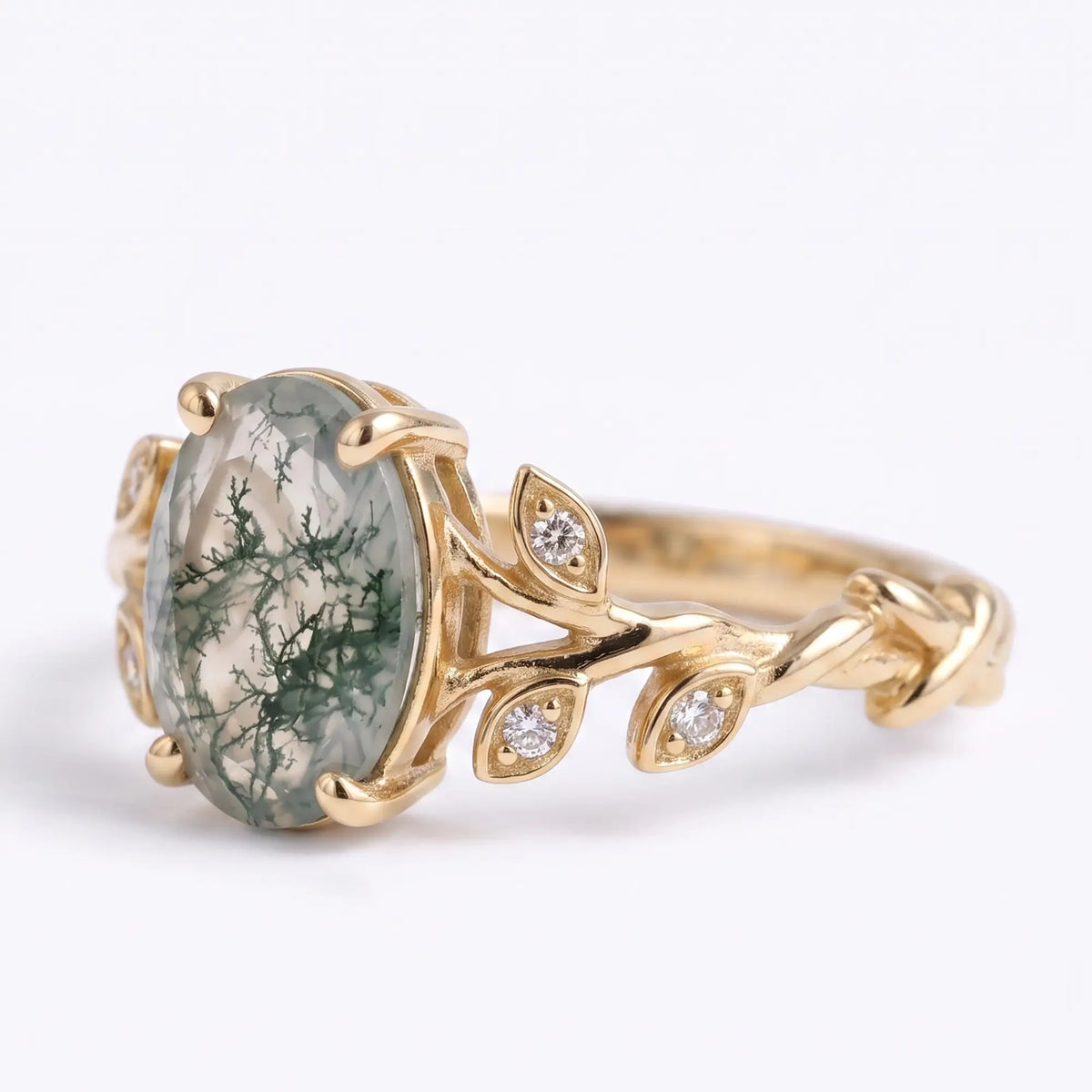 Front view of nature inspired oval moss agate botanical engagement ring