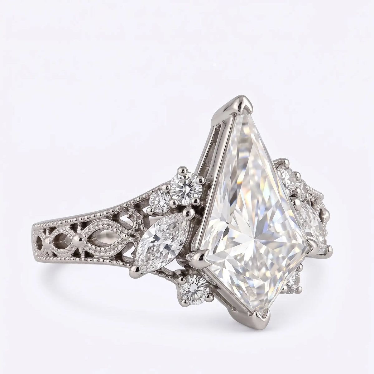Three-quarter view of Edwardian-inspired kite moissanite ring with delicate openwork shoulders