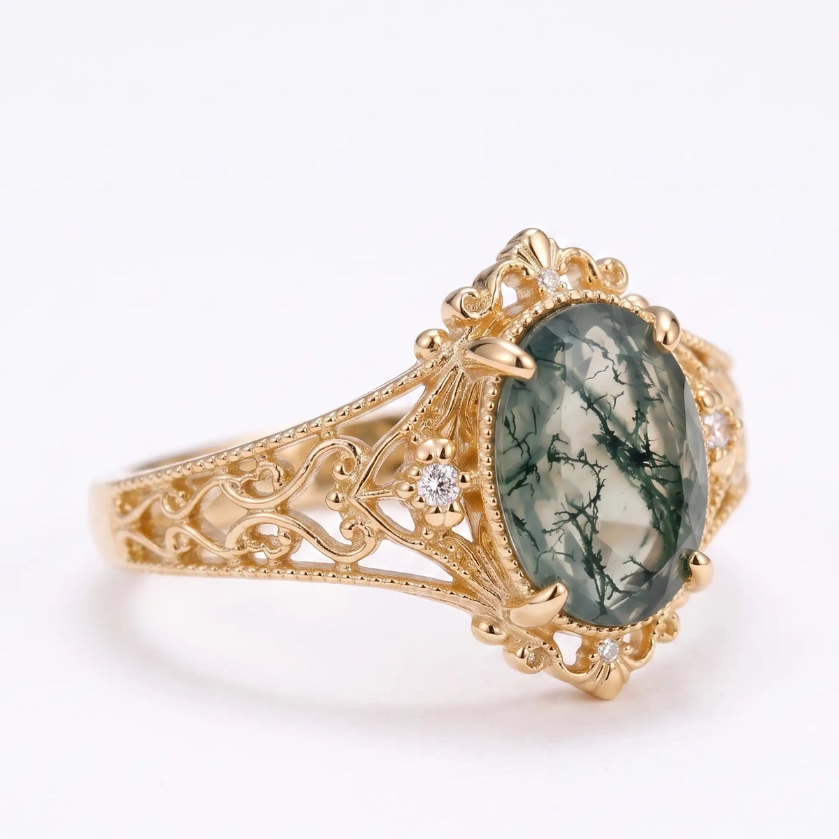 Front view of antique inspired oval moss agate engagement ring
