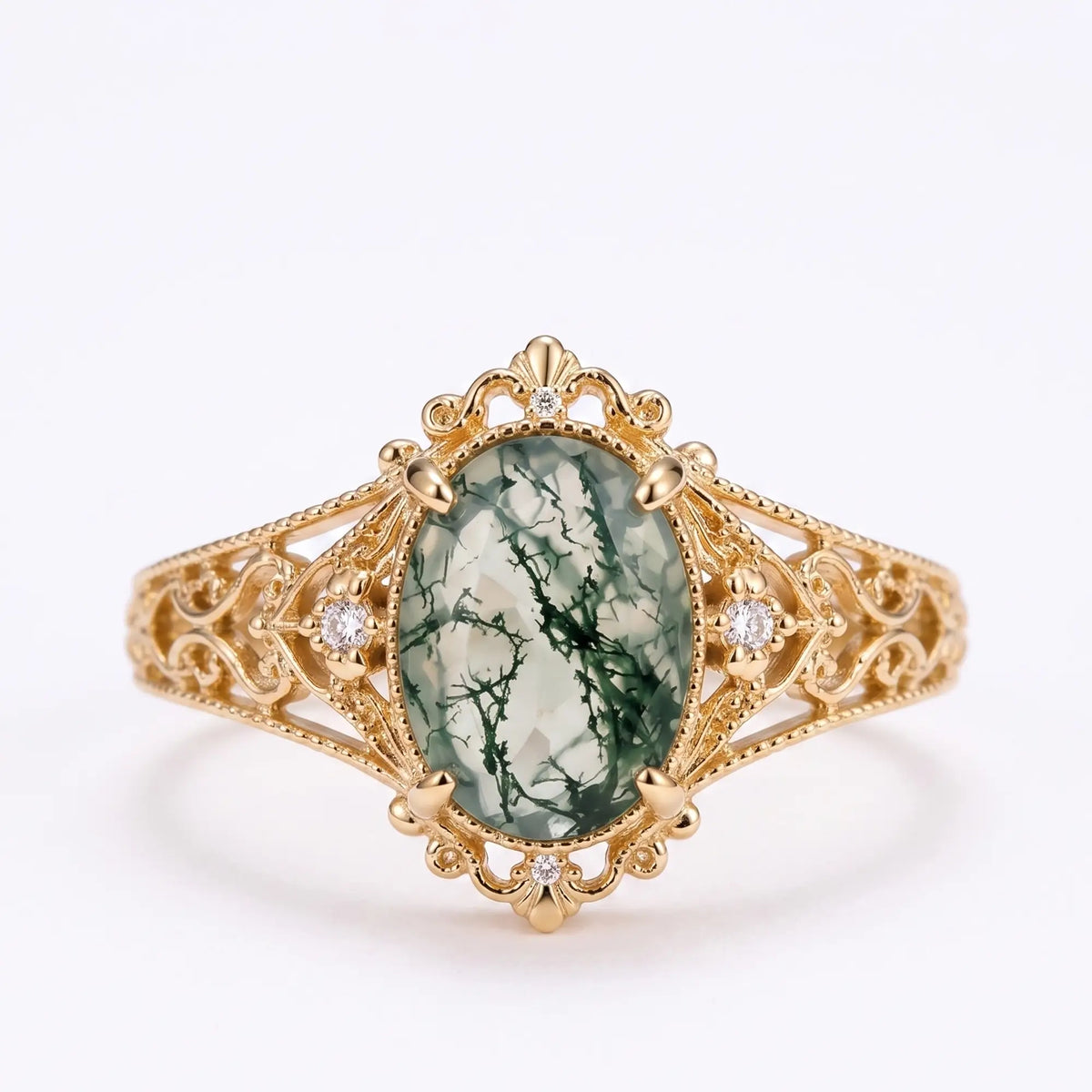 Vintage oval moss agate Edwardian engagement ring with filigree gold setting