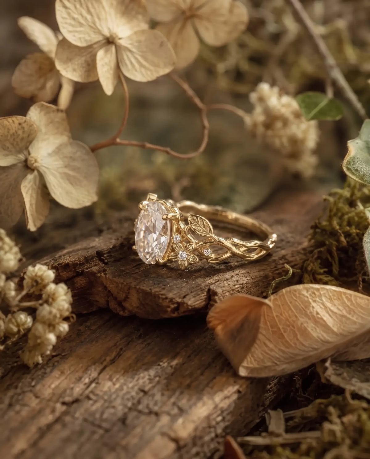 Romantic floral moissanite ring with organic vine detailing