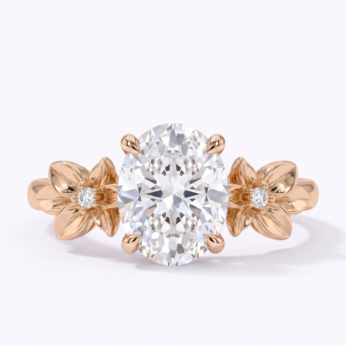 Oval moissanite floral three stone engagement ring in rose gold