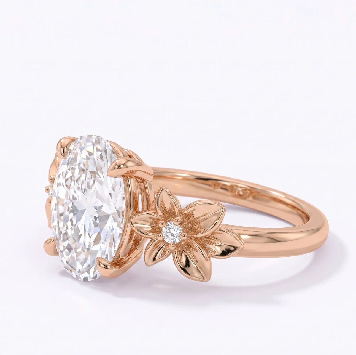 Botanical three stone ring with sculpted flower side details