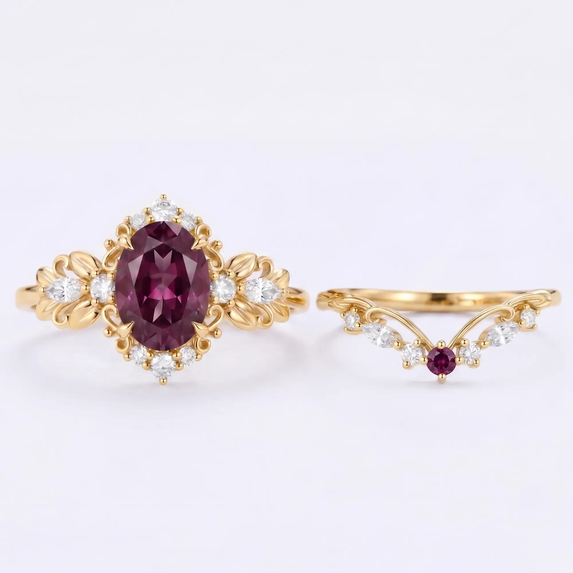 Detailed close-up view of a 6x8mm oval-cut lab alexandrite engagement ring featuring intricate carved gold leaf details and round brilliant side clusters