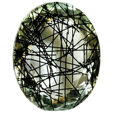 Oval black rutilated quartz gemstone