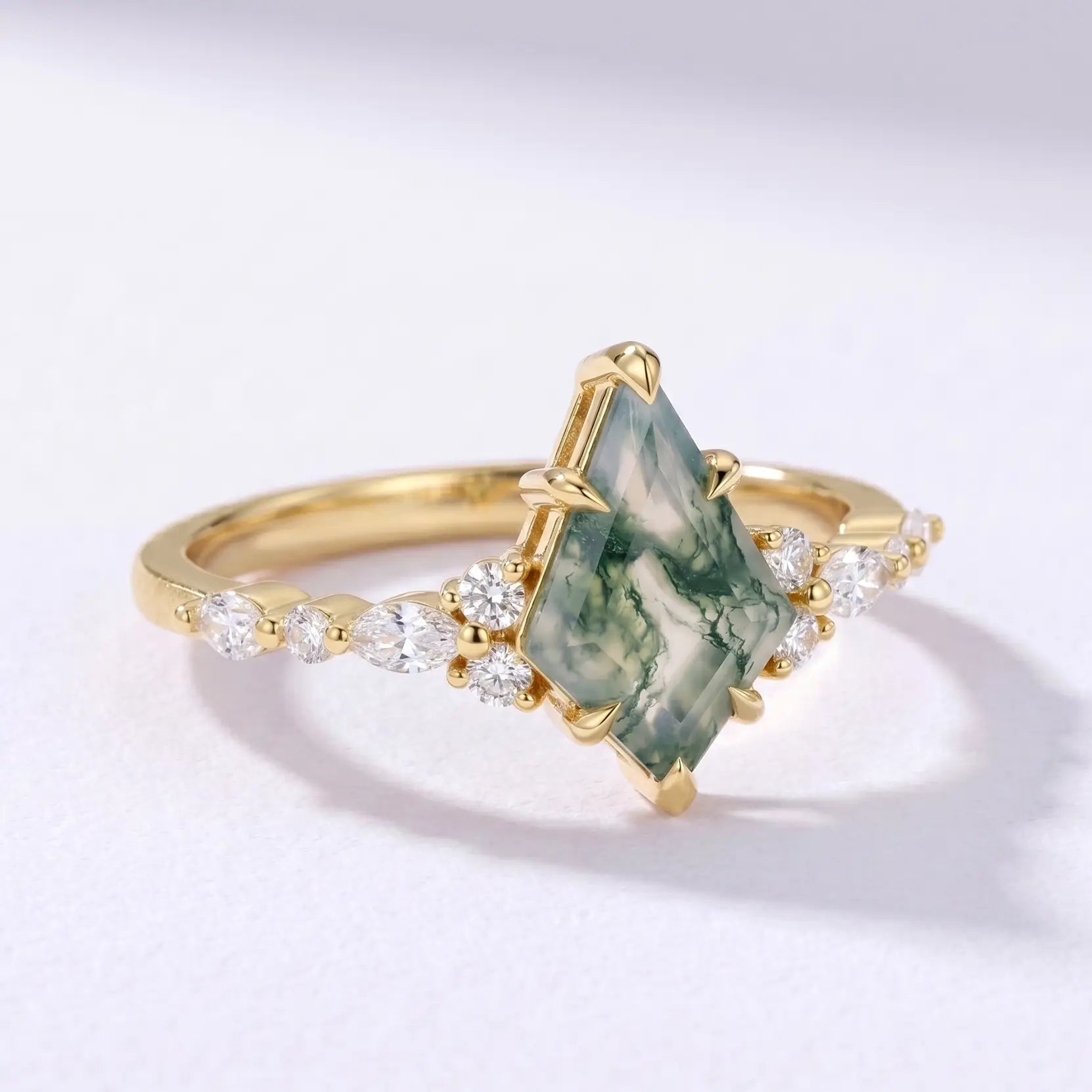 Side profile view of a dainty 1.7mm solid gold moss agate ring band showcasing a low-profile setting and polished finish