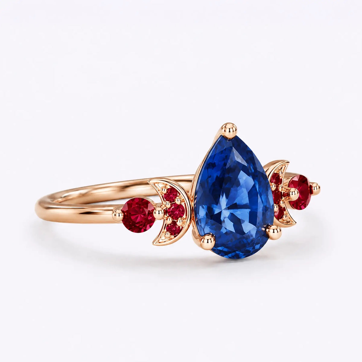 Side view of sapphire engagement ring showing artistic moon-inspired design