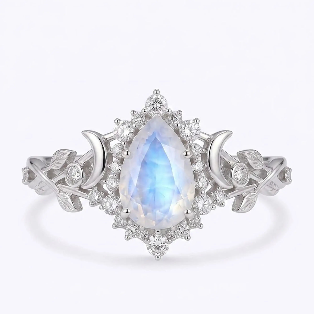 Pear moonstone celestial halo engagement ring in white gold