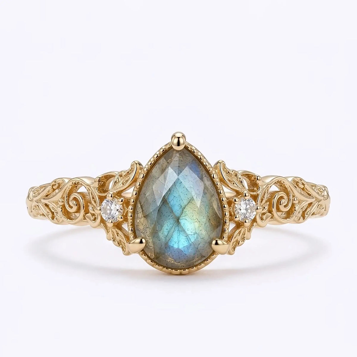 Pear cut labradorite Victorian engagement ring in yellow gold