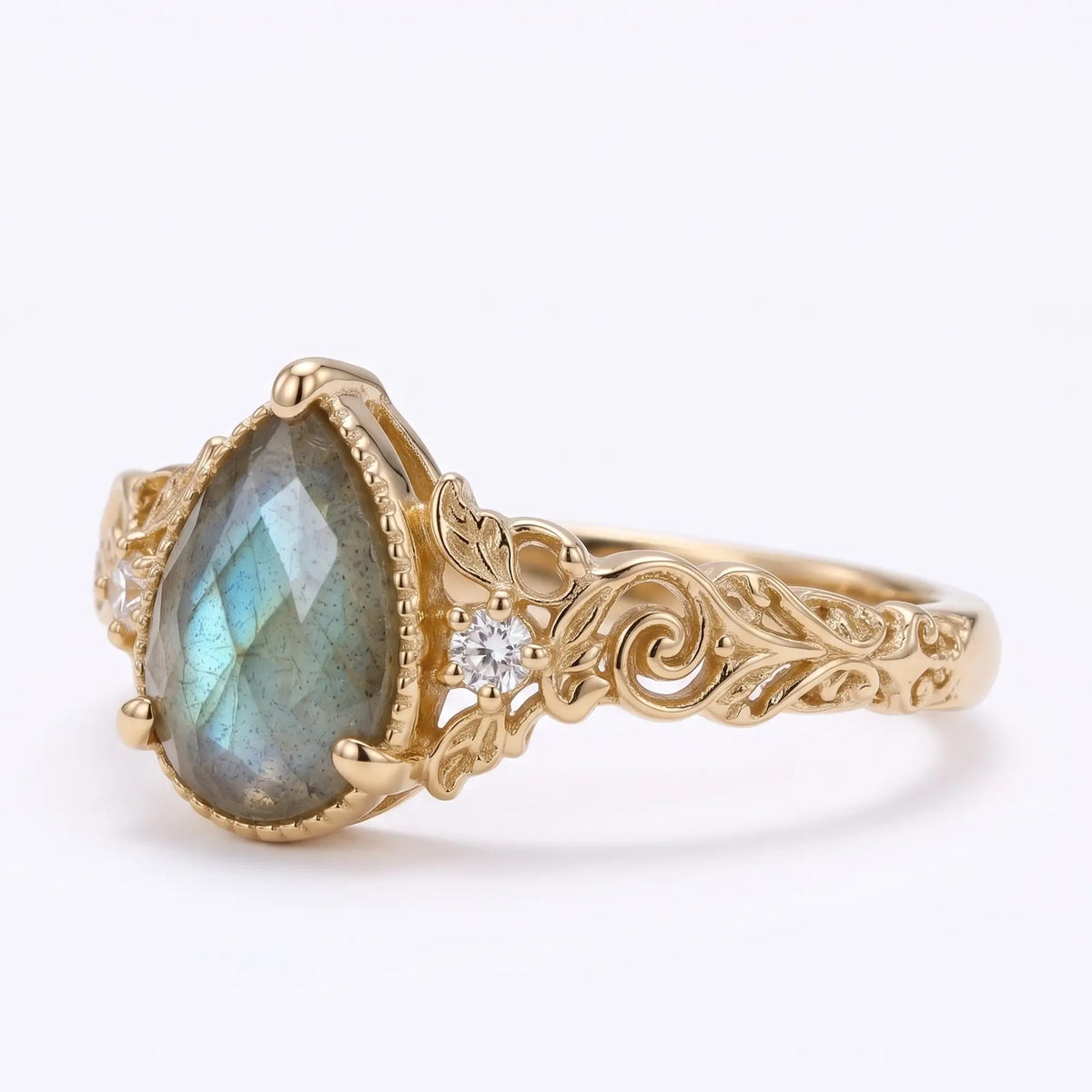 Nature inspired pear labradorite ring with moissanite accents