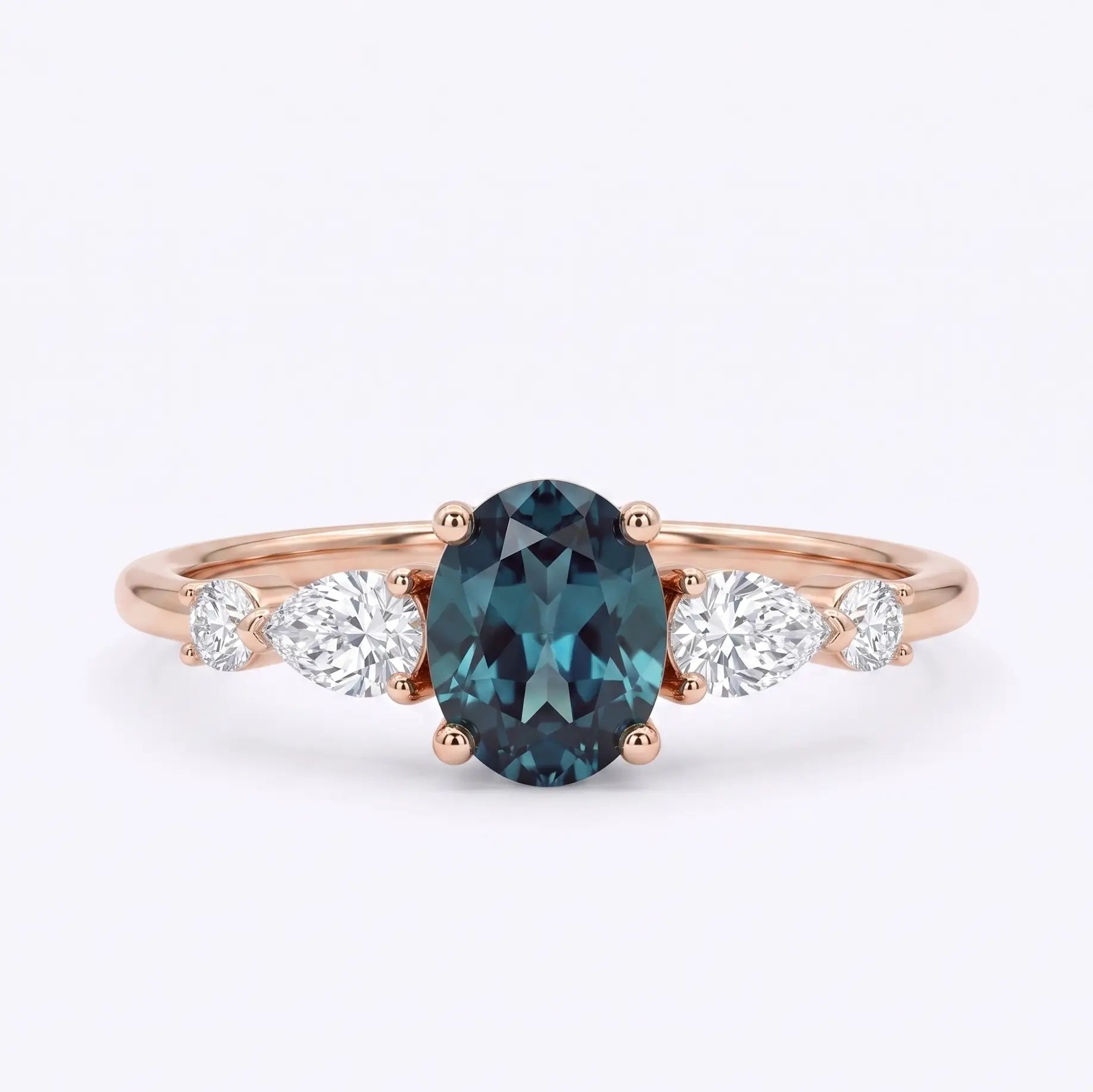Handcrafted dainty 5-stone oval lab alexandrite engagement ring with pear and round cut moissanite accents by Orleone