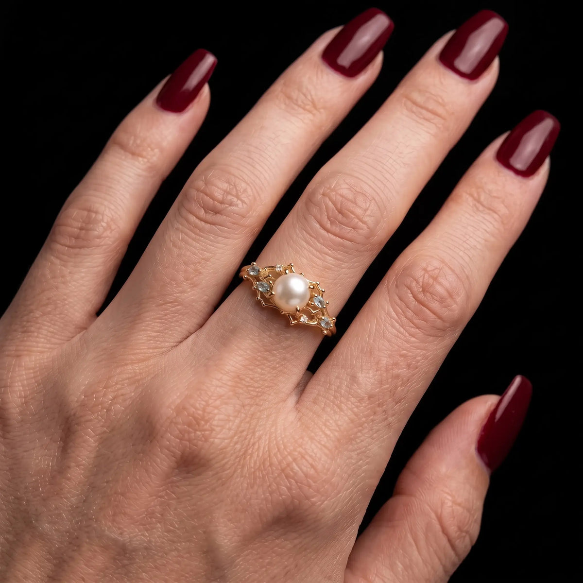 June birthstone Akoya pearl ocean inspired ring worn on hand