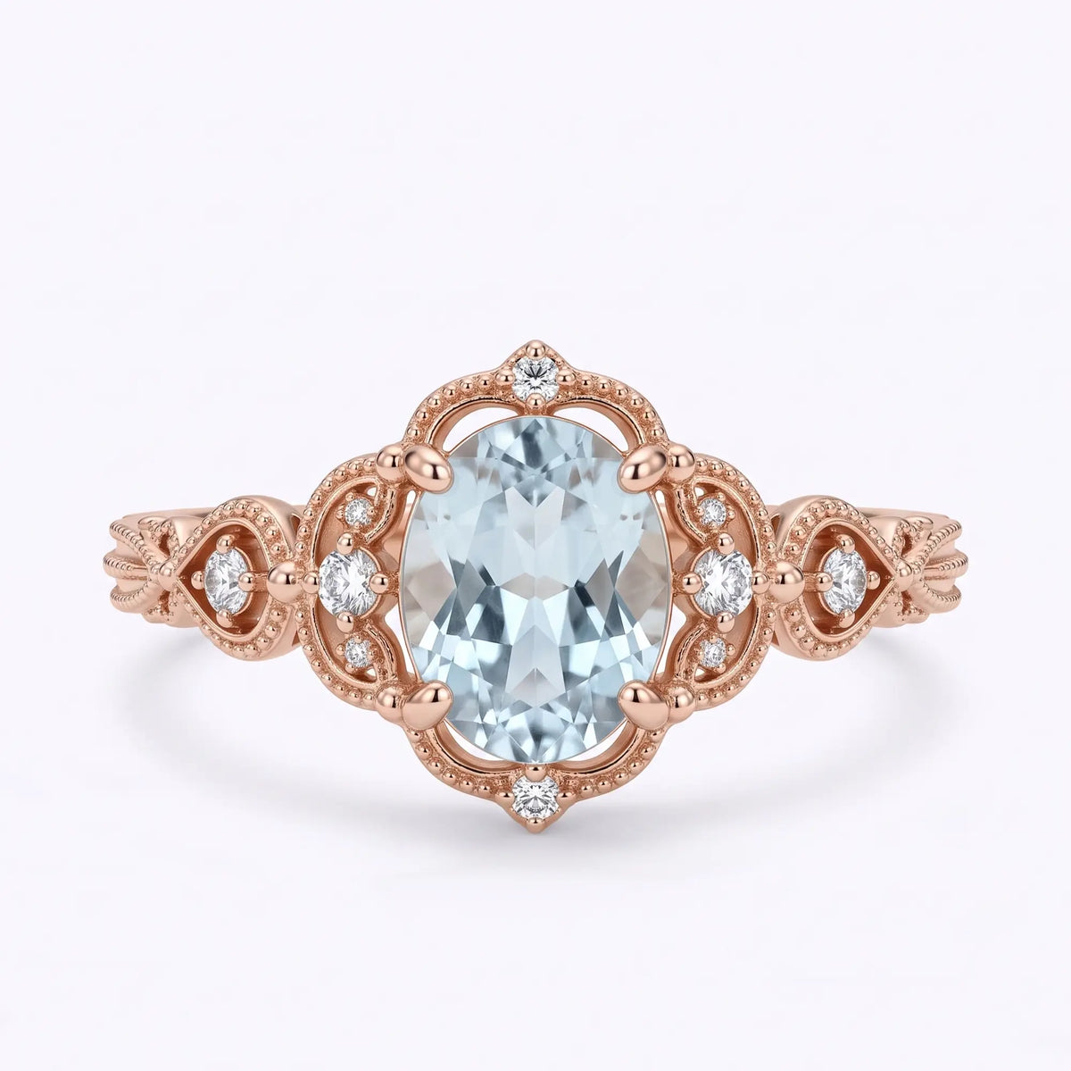 Vintage oval aquamarine engagement ring with delicate openwork