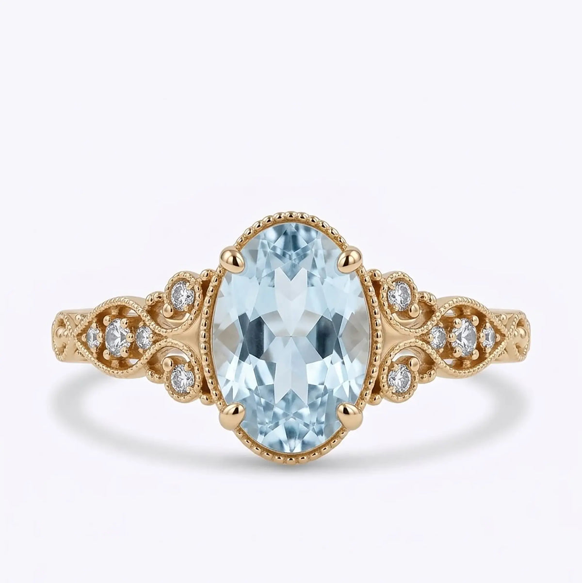 Vintage oval aquamarine engagement ring in yellow gold