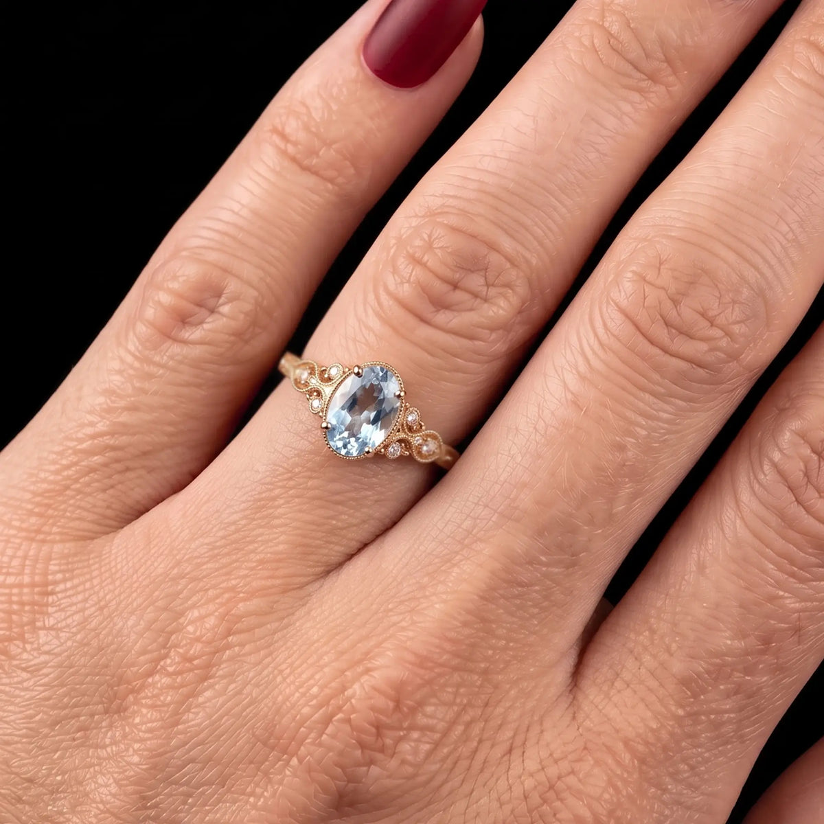 Vintage oval aquamarine ring worn on hand