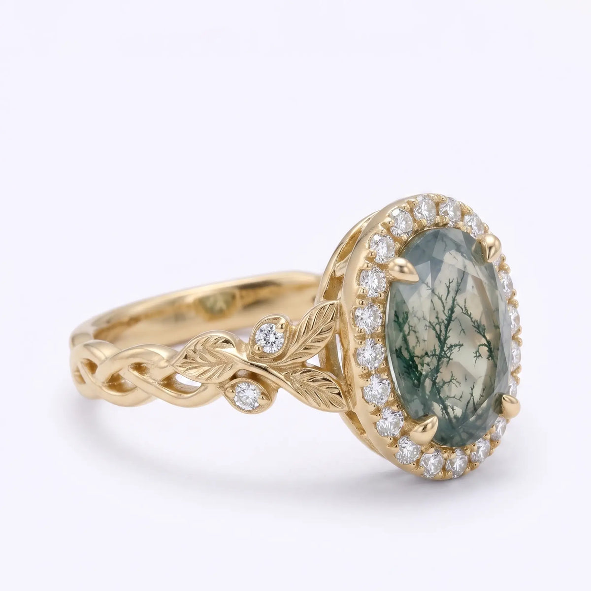 Front view of natural moss agate engagement ring with round moissanite halo