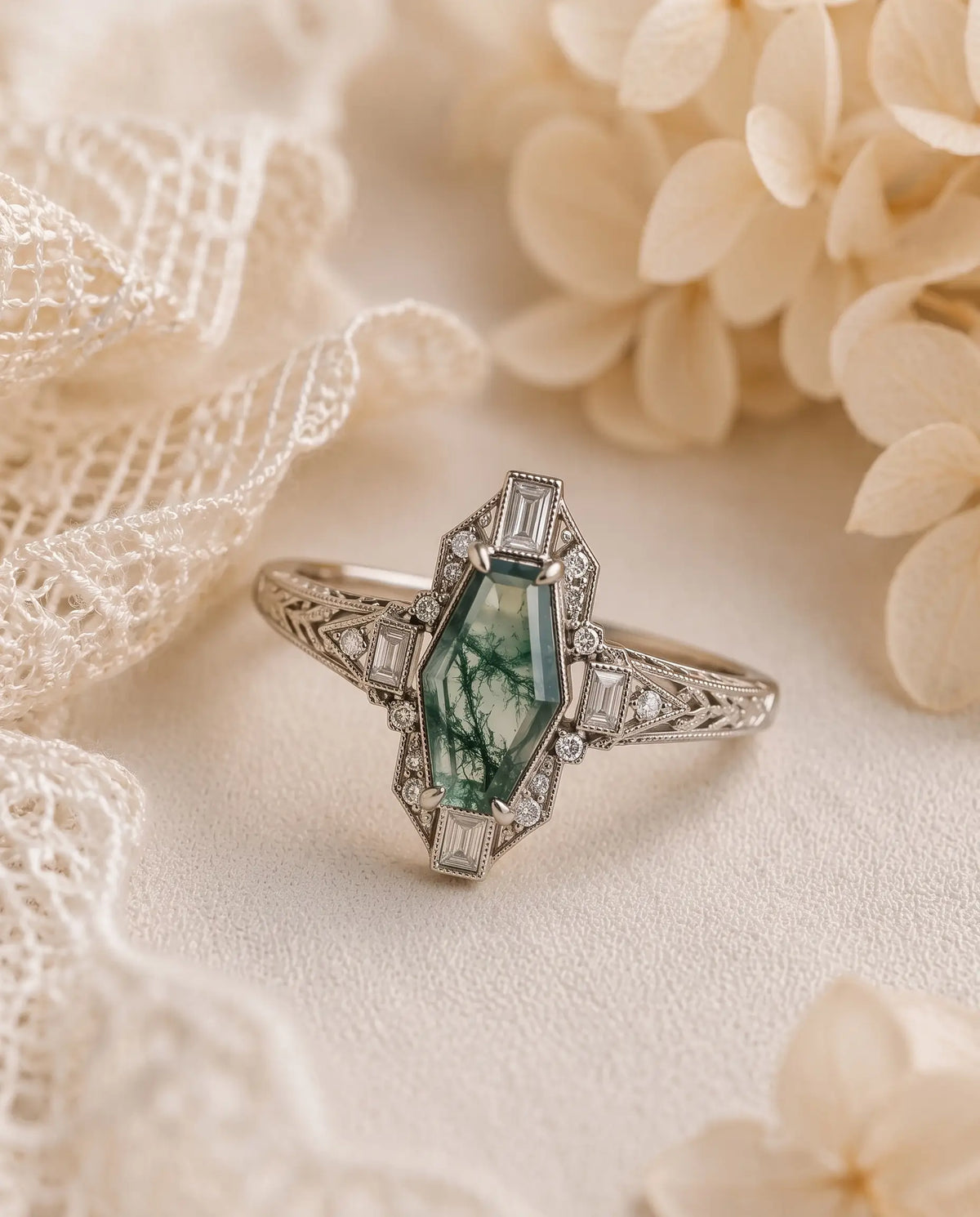 Detail of baguette moissanite side stones on Gothic halo moss agate ring