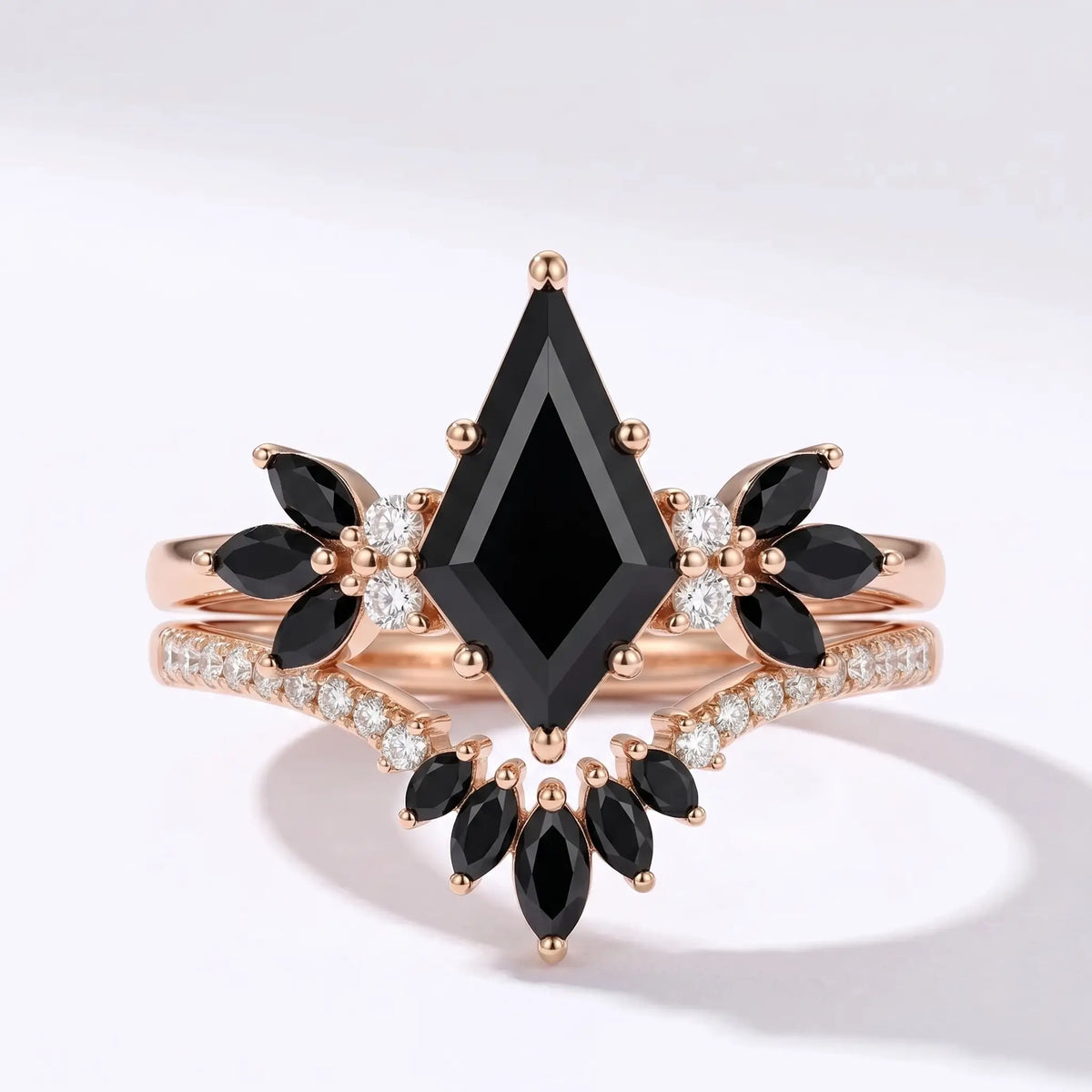 Kite cut black moissanite bridal ring set with gothic cluster accents in rose gold