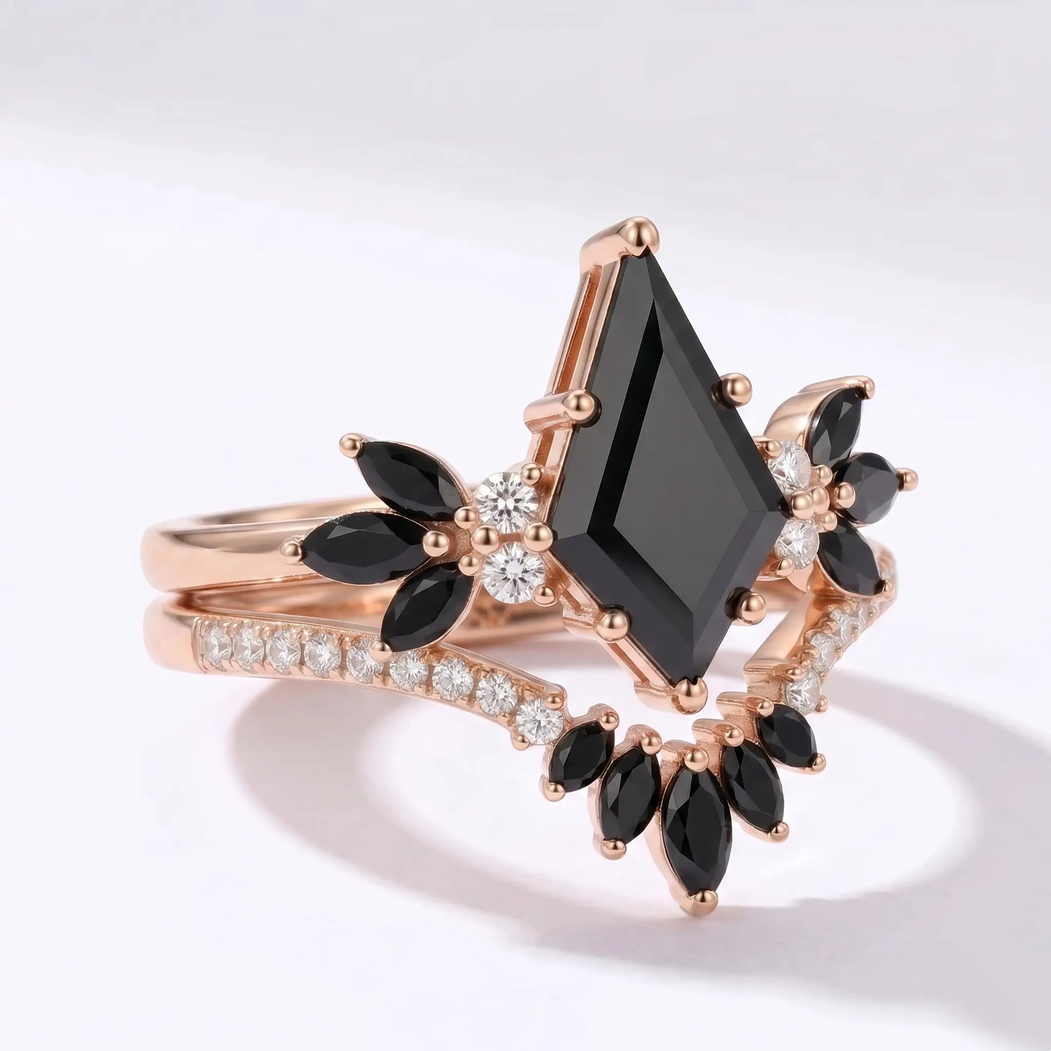 Side view of kite cut black moissanite bridal set showing layered band design