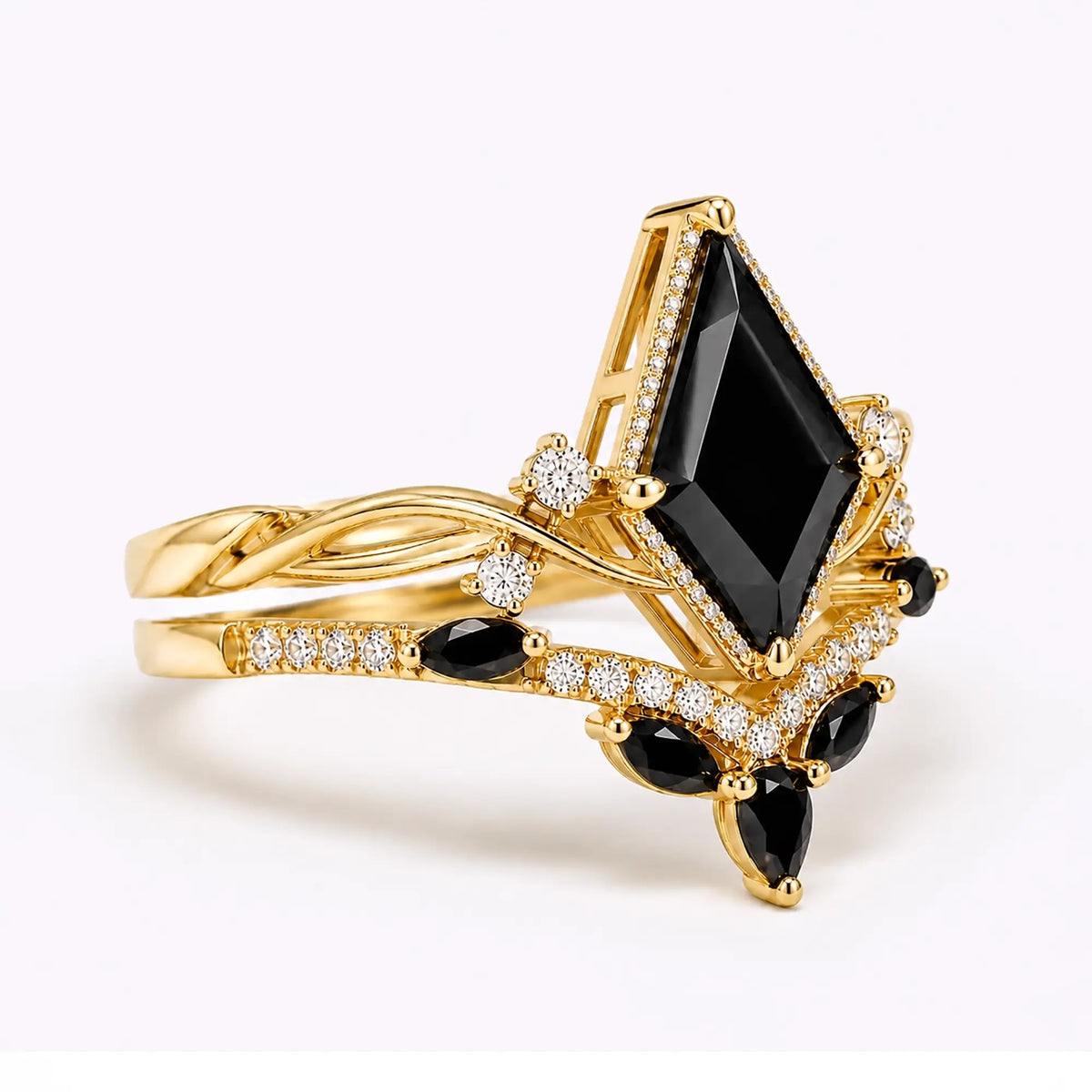 Side view of kite black onyx engagement ring set showing twisted band structure