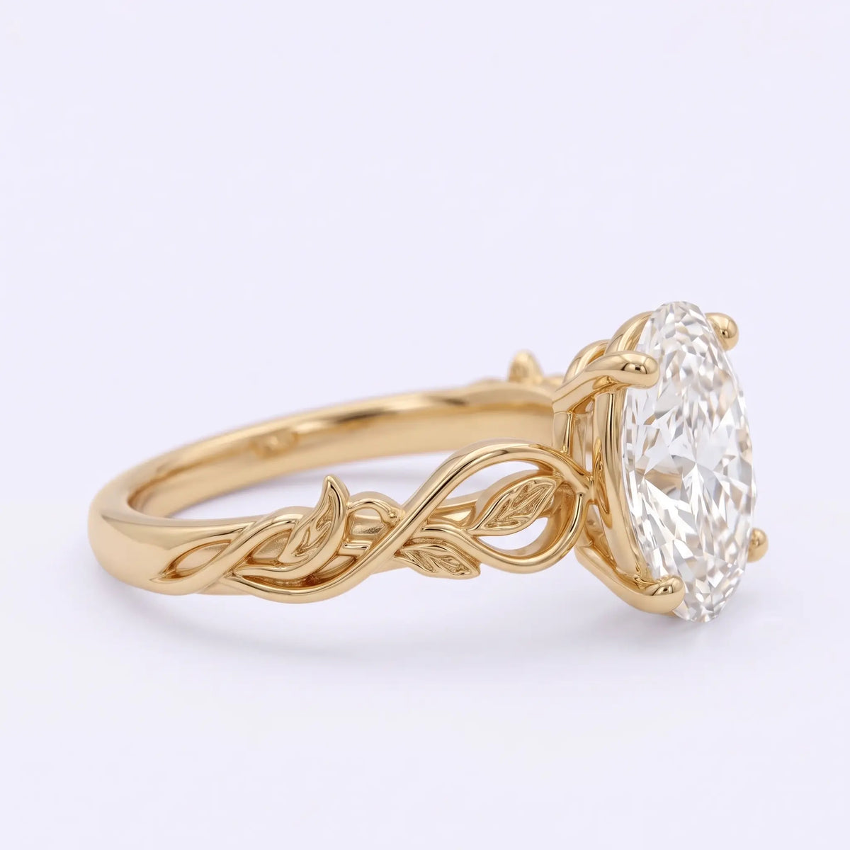 Side view of oval lab-grown diamond engagement ring with sculptural leaf and vine shoulders