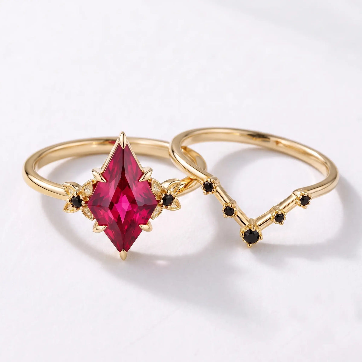 Kite ruby engagement ring and matching contour band displayed separately in one frame