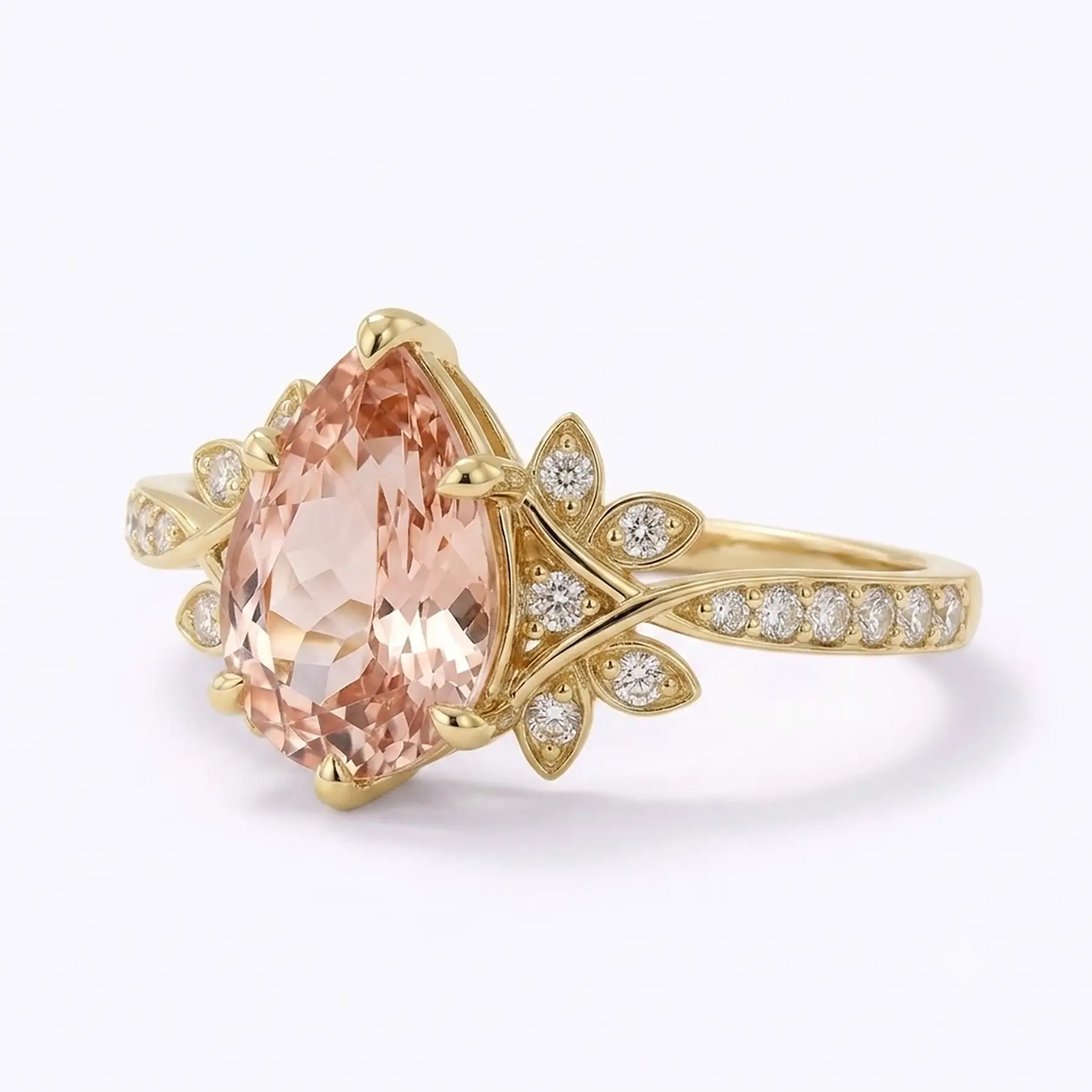 Left view of pear cut morganite cluster anniversary ring with floral side details