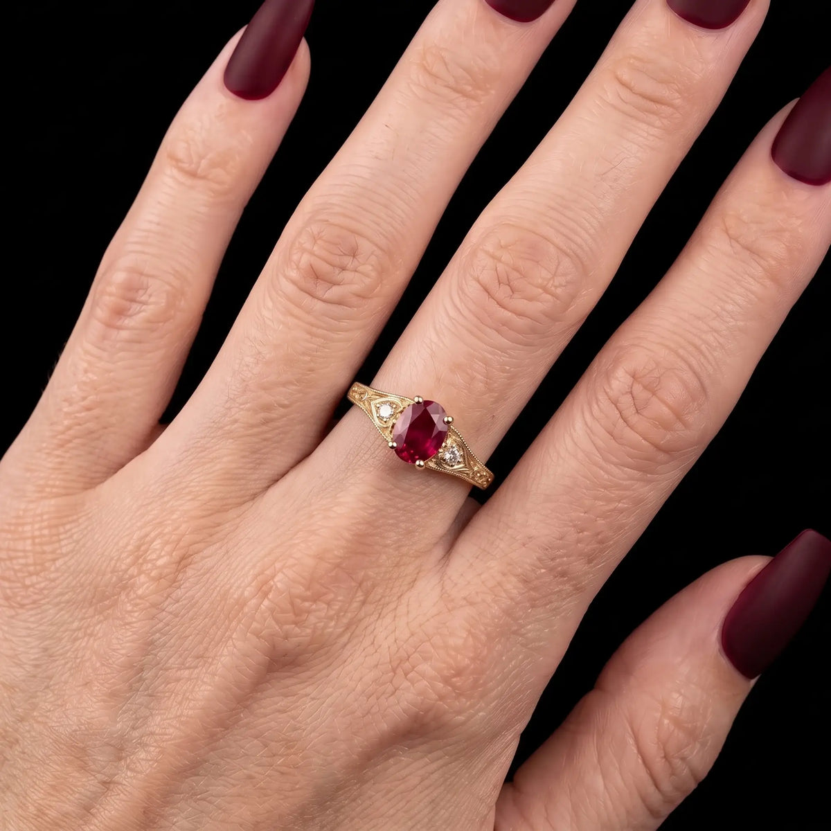 July birthstone ruby engagement ring worn on hand