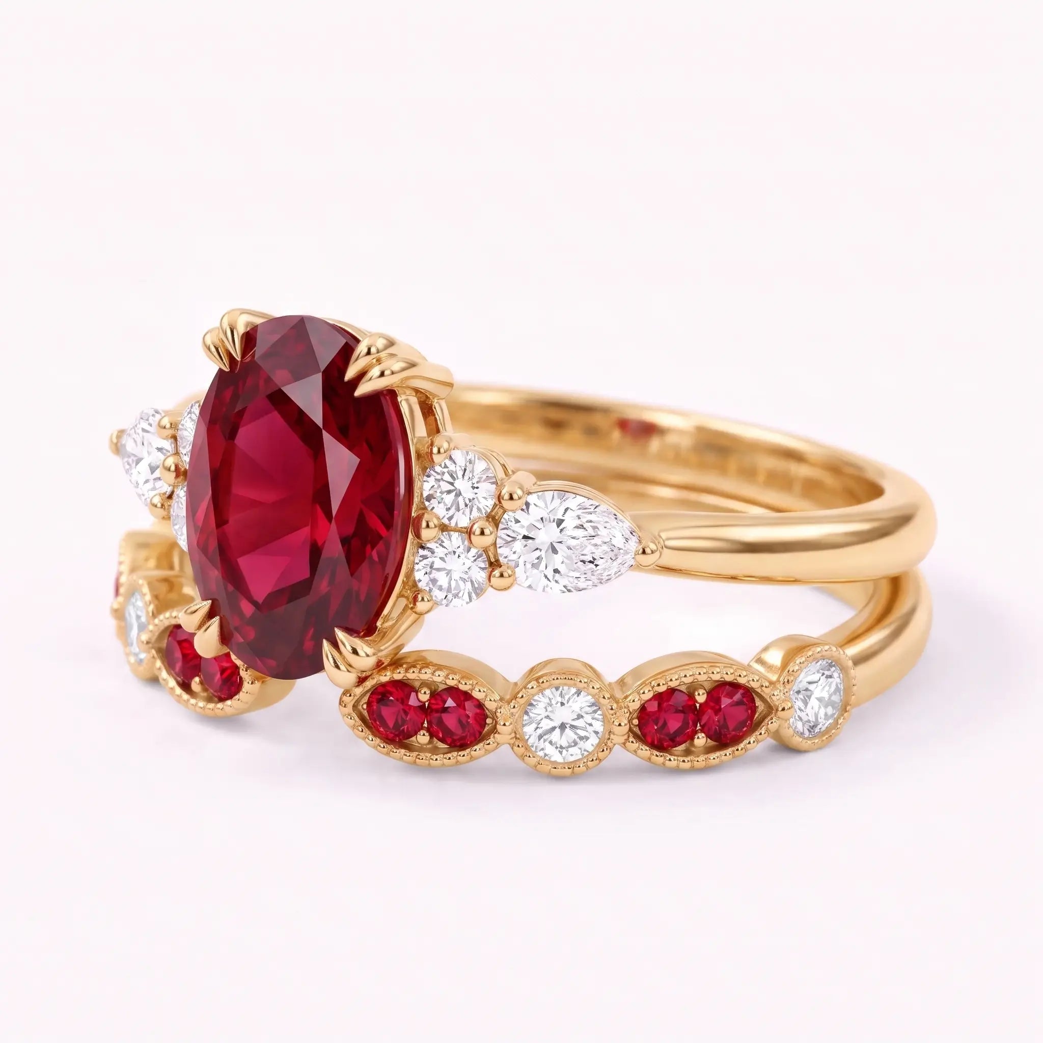 Left view of oval ruby bridal ring set with cluster side stones and matching band