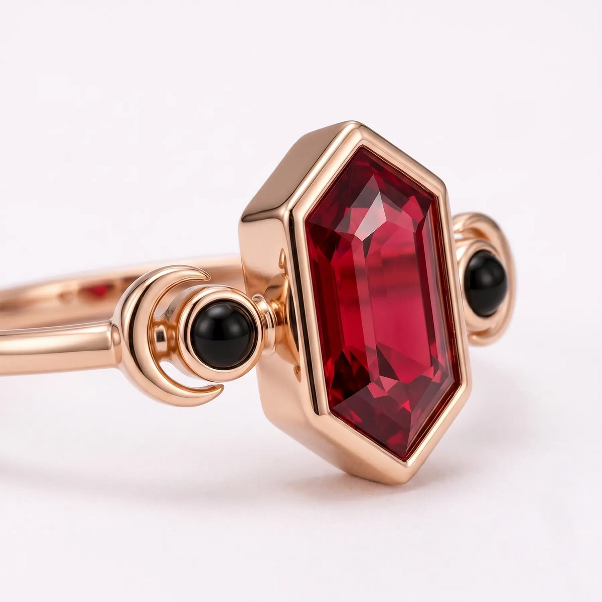Close-up of elongated hexagon lab ruby center stone with black onyx accents