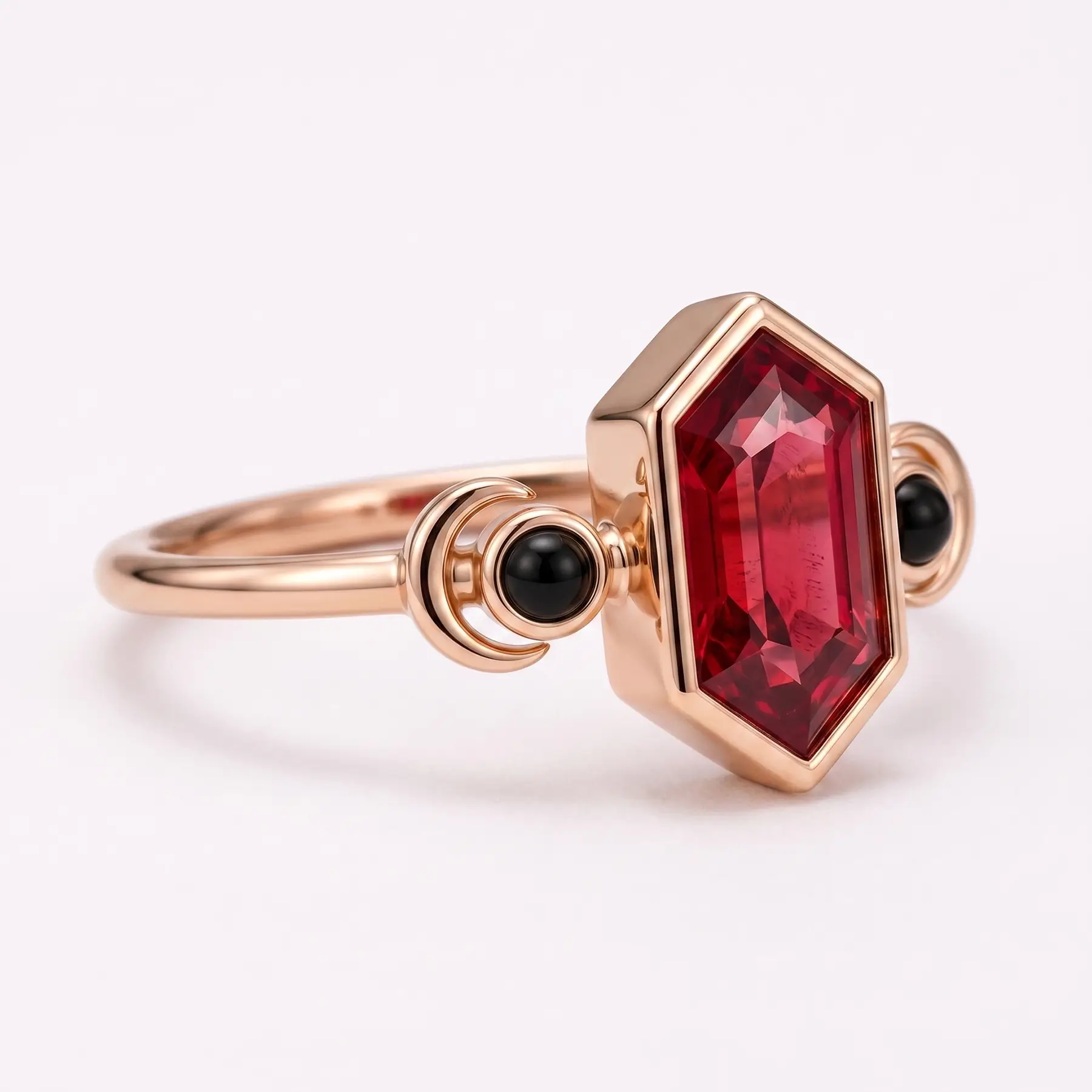 Left view of hexagon ruby ring with black onyx side stones and crescent moon details