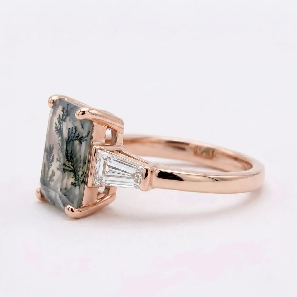 Side profile view of a dainty 1.7mm solid gold moss agate ring band showing the open under-rail architecture for maximum light entry
