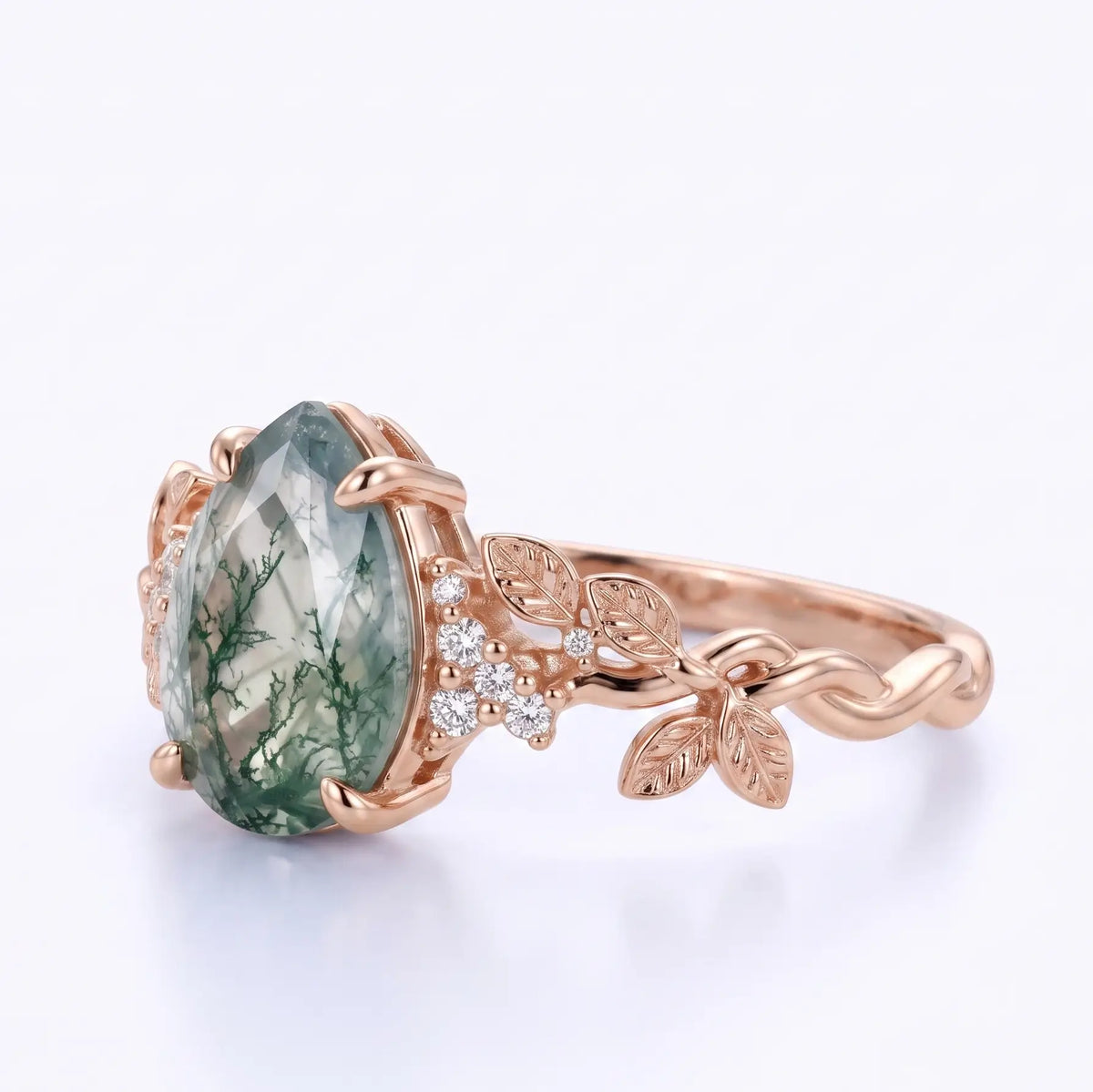 Leaf and vine band detail on nature inspired moss agate ring