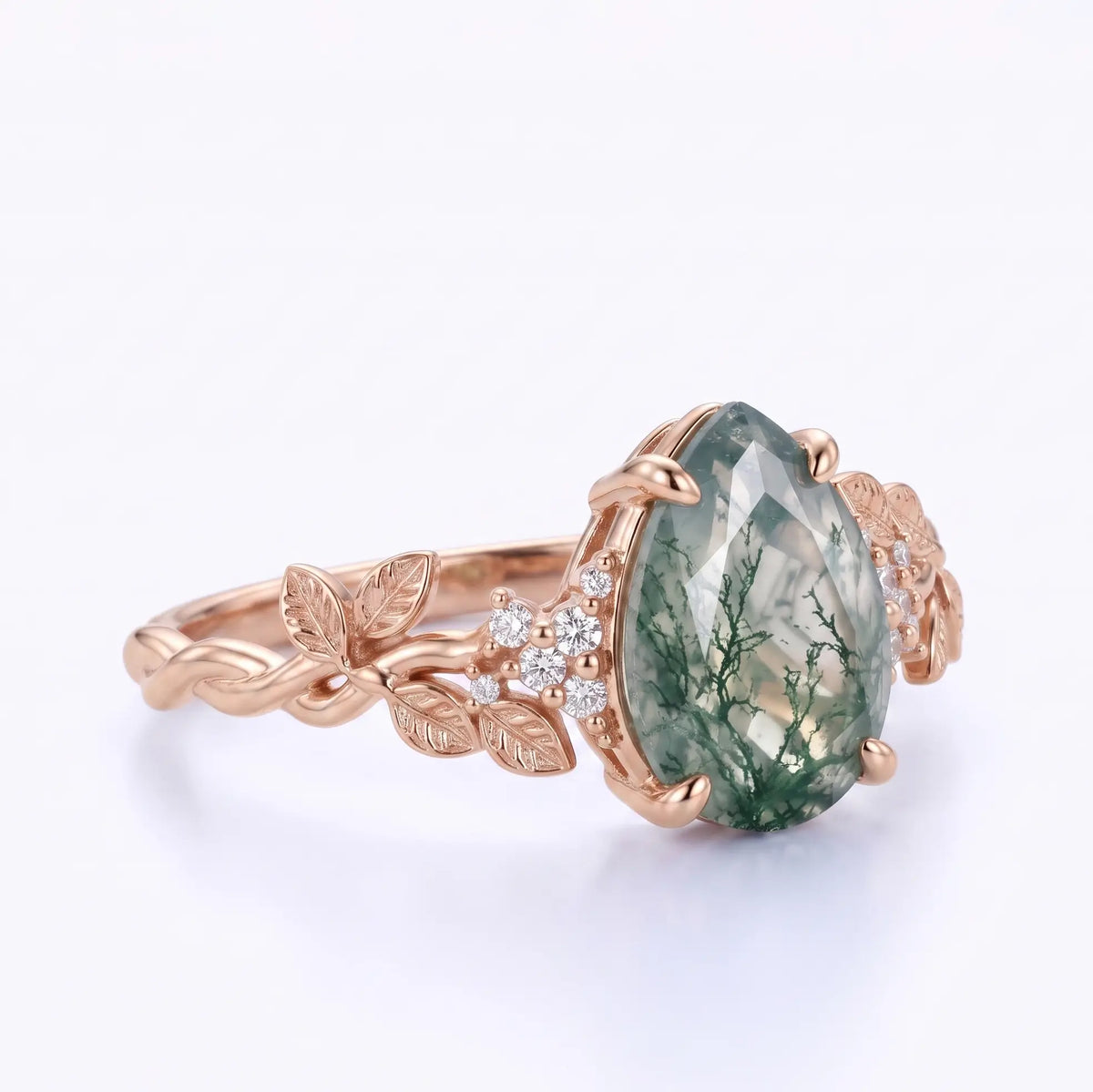 Front view of pear moss agate botanical engagement ring in gold