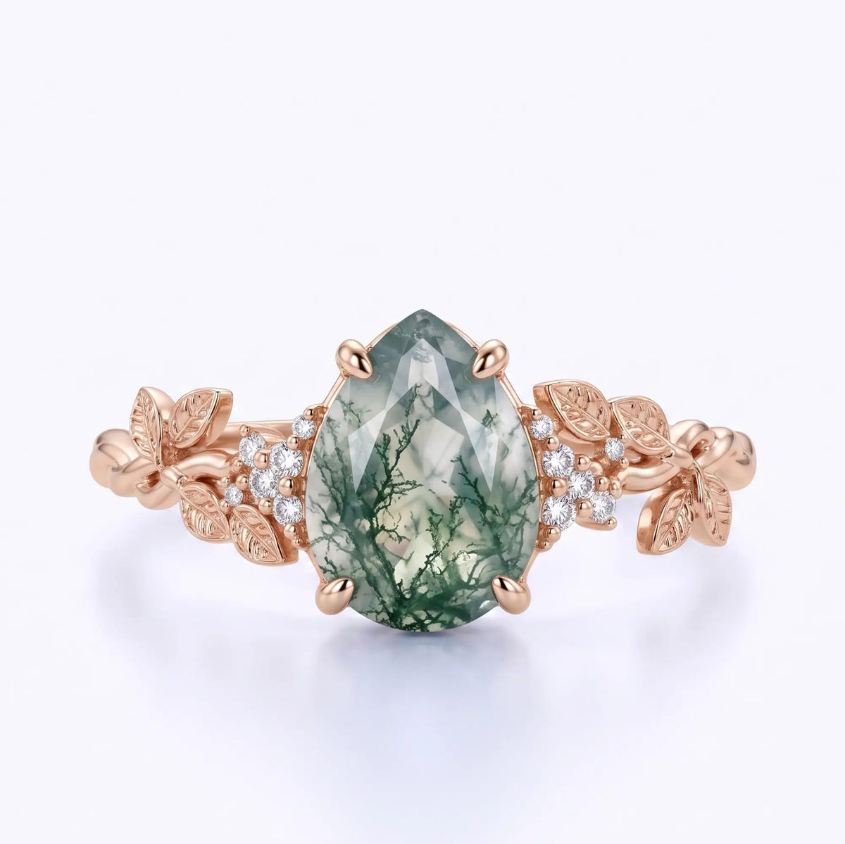 Pear moss agate leaf engagement ring with round moissanite cluster accents