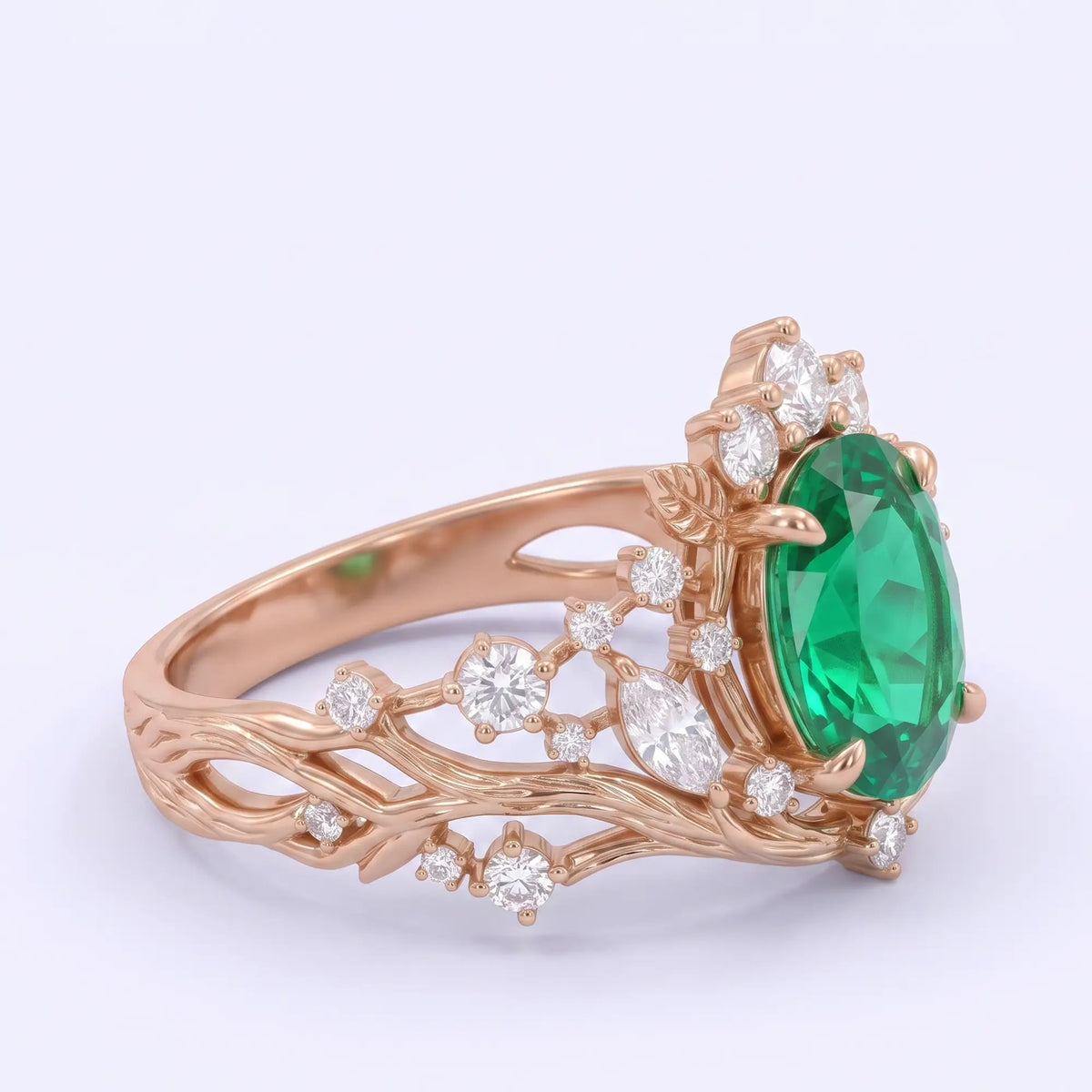 Botanical gold engagement ring with oval lab emerald and moissanite accents