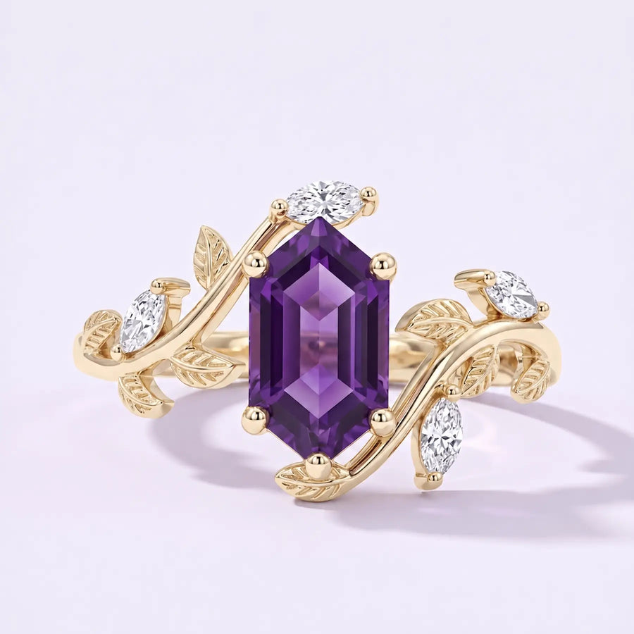 Elongated hexagon sapphire leaf engagement ring with marquise moissanite accents in yellow gold
