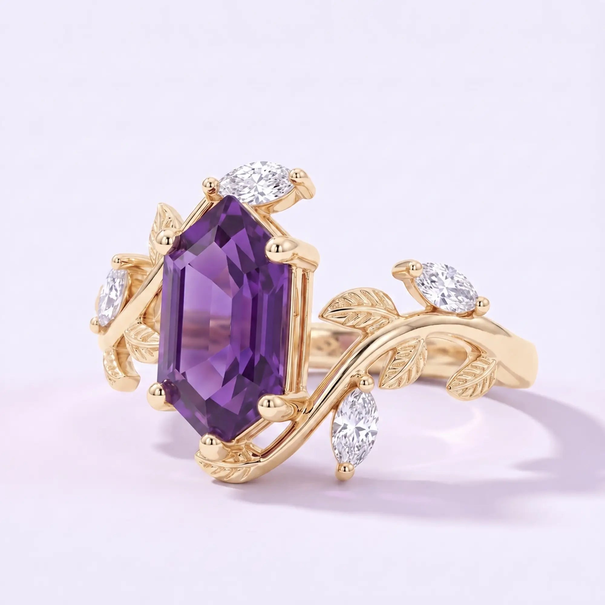 Left view of hexagon sapphire ring with leaf details and marquise side stones