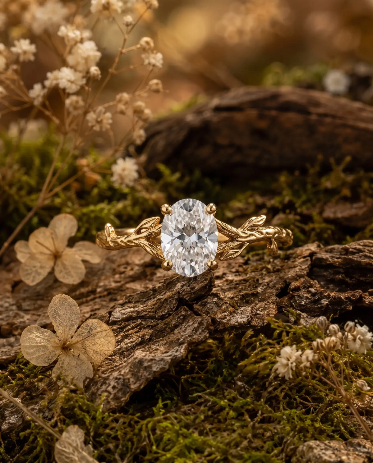 Botanical solitaire ring with oval moissanite and leaf details