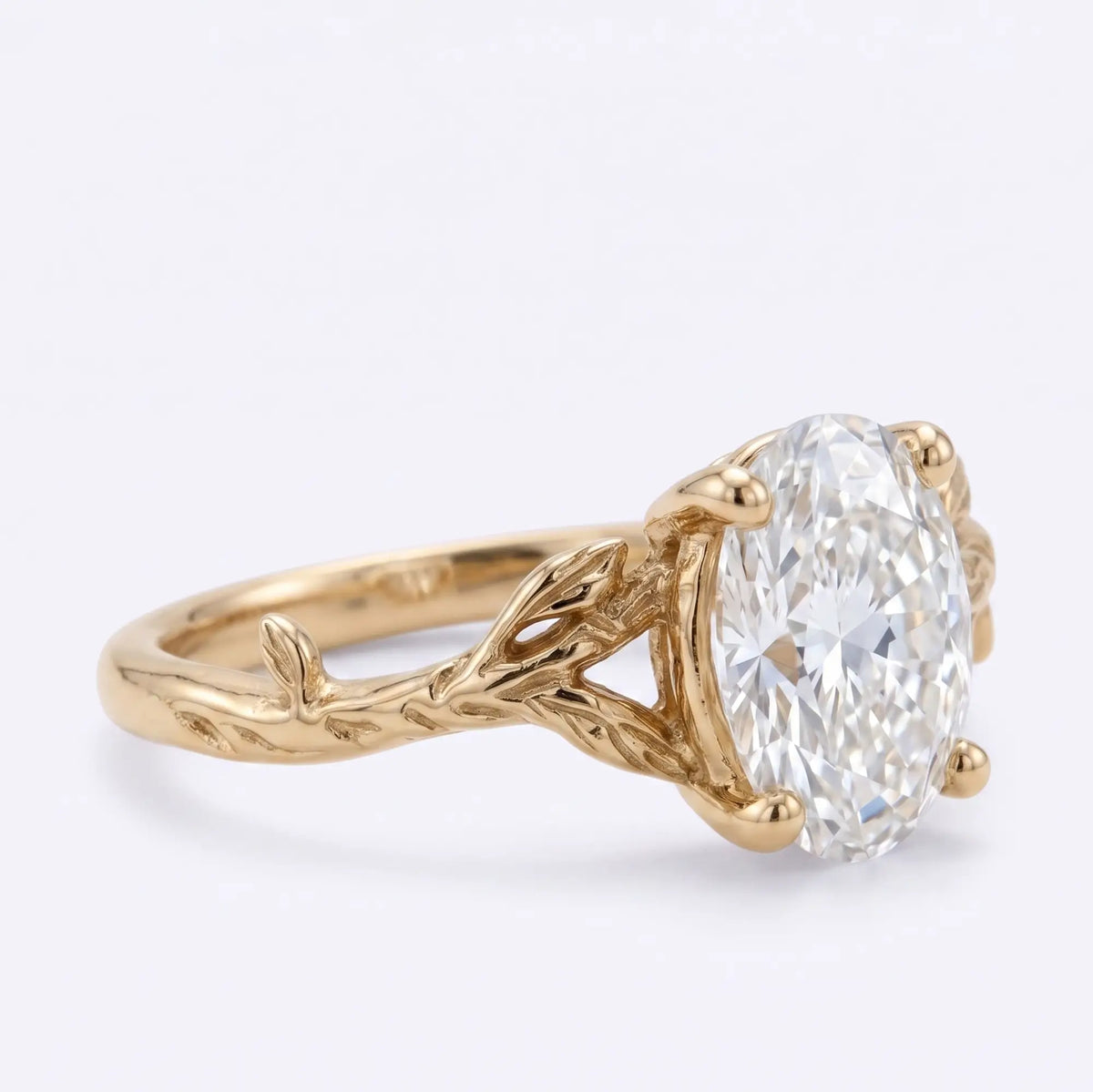 Nature inspired oval moissanite engagement ring with branch band