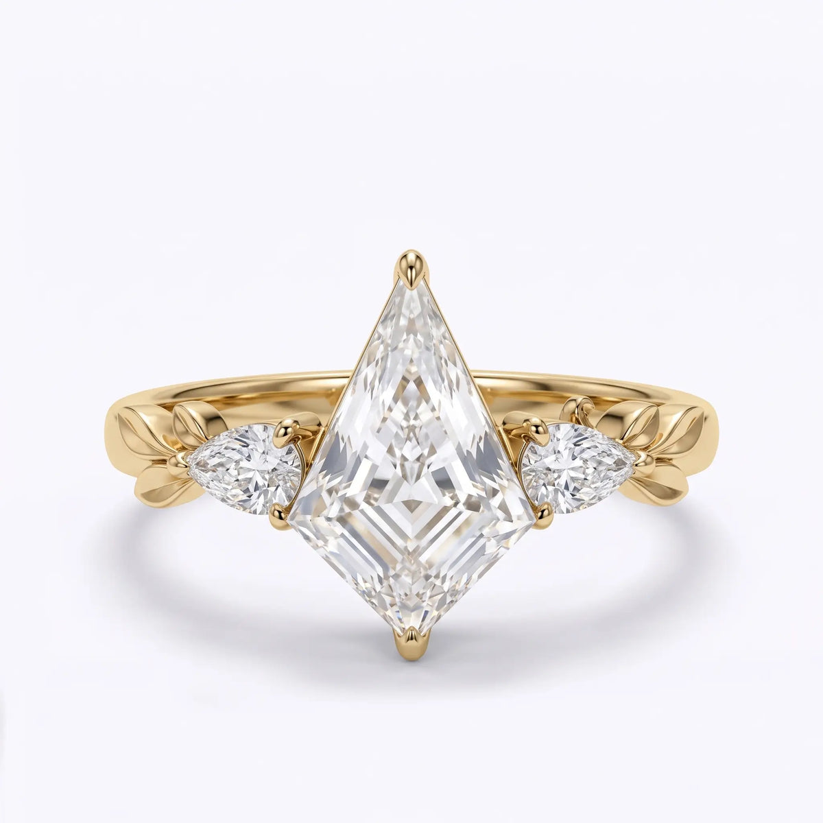 Nature inspired kite cut moissanite three stone engagement ring with pear shaped accents and sculpted leaves in yellow gold