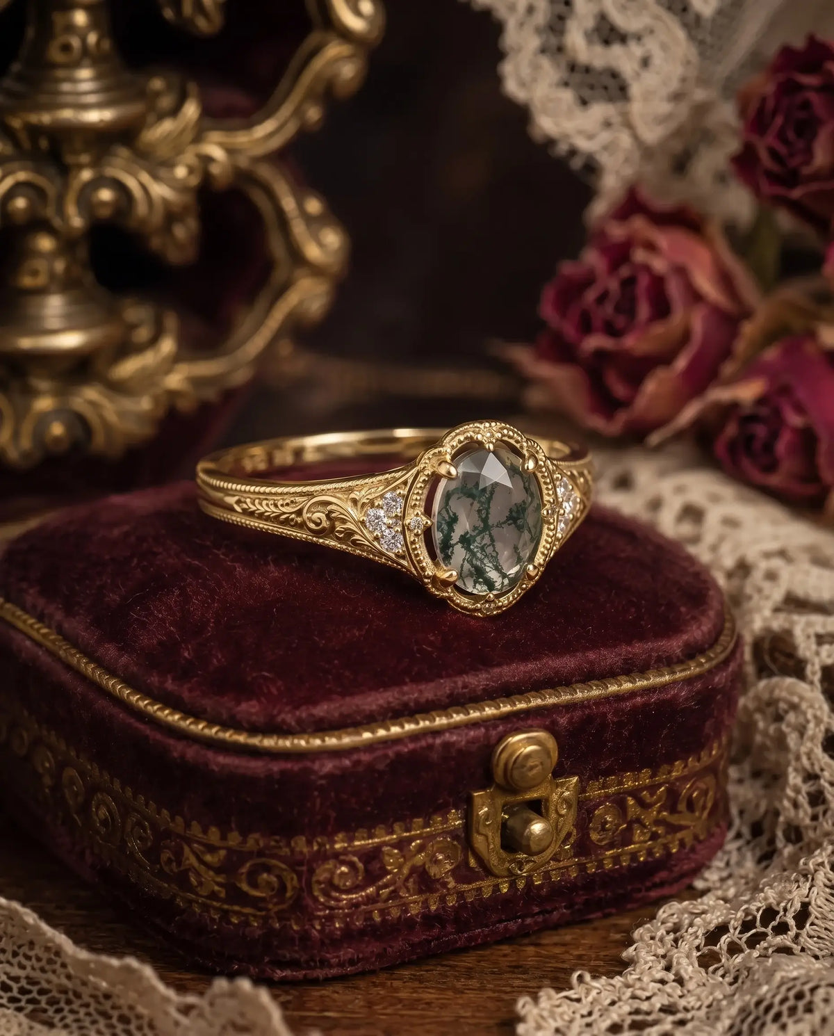 Side detail of oval moss agate ring with moissanite cluster accents