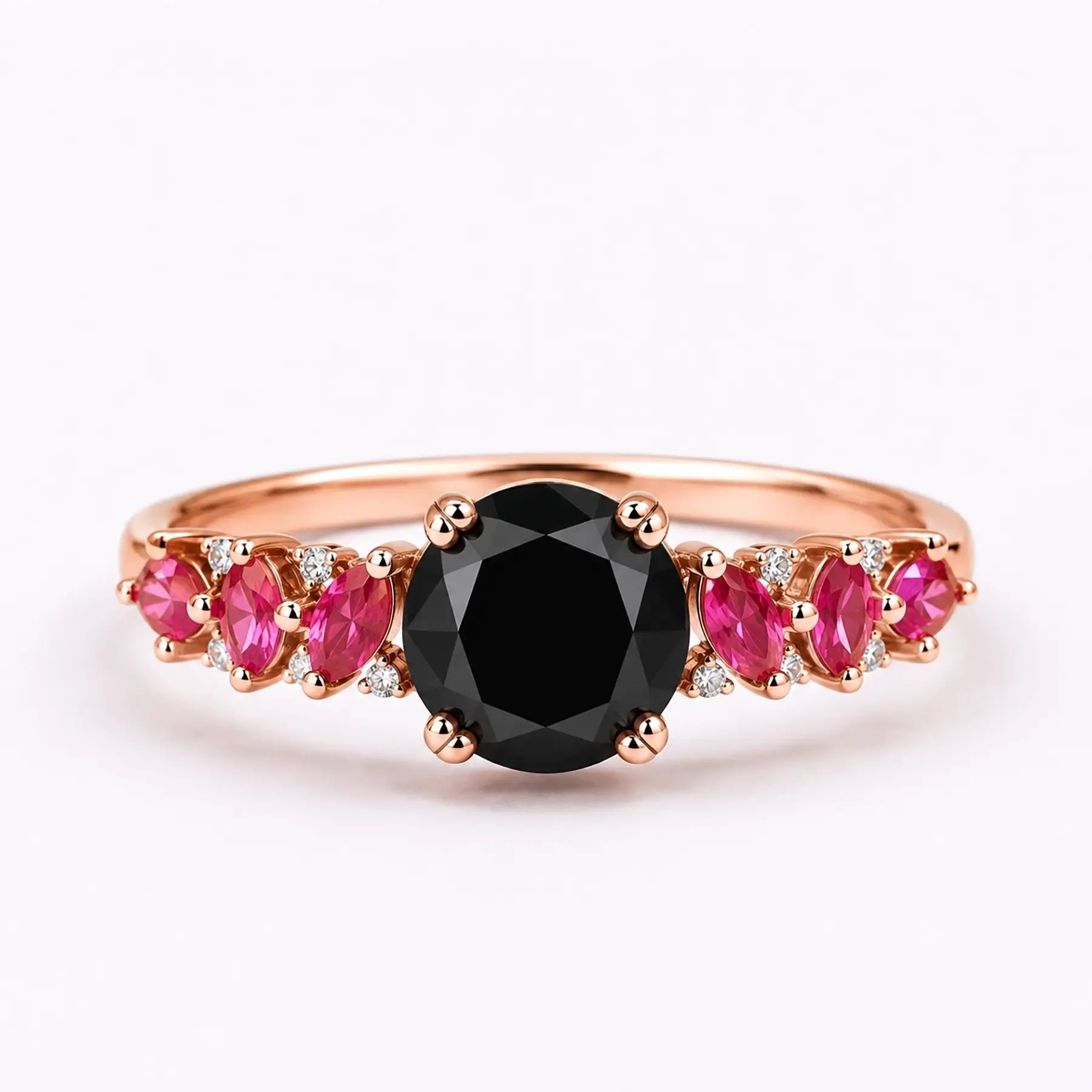 Round black moissanite engagement ring with marquise ruby cluster accents in rose gold