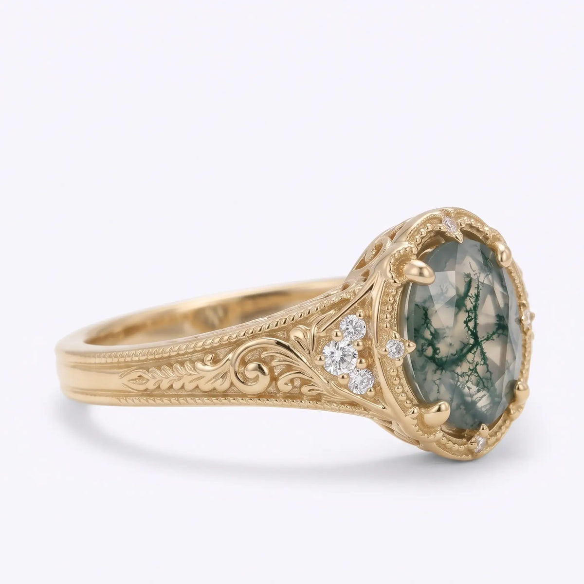 Antique inspired oval moss agate ring with milgrain detailing