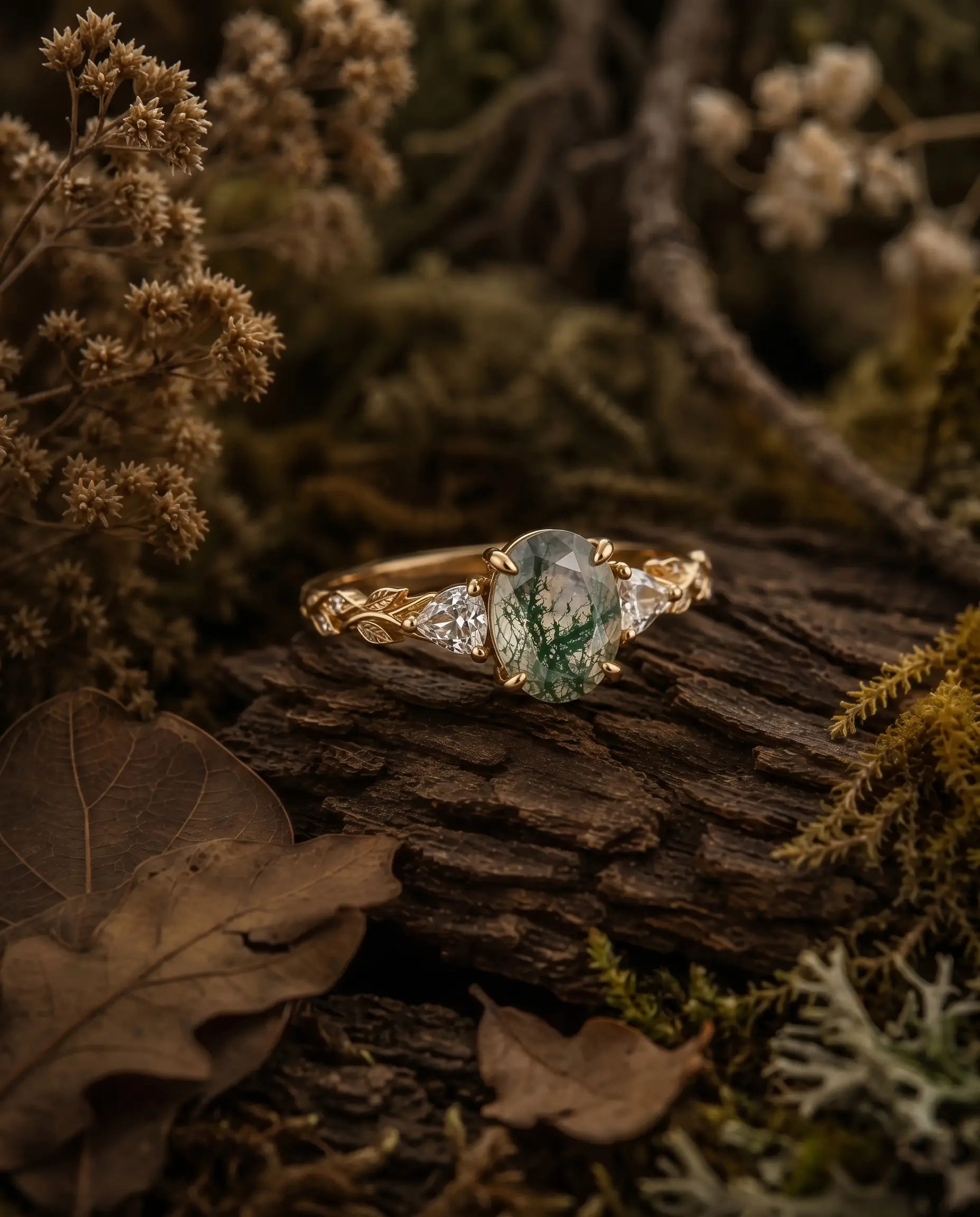 Close-up of natural oval moss agate with forest-like inclusions