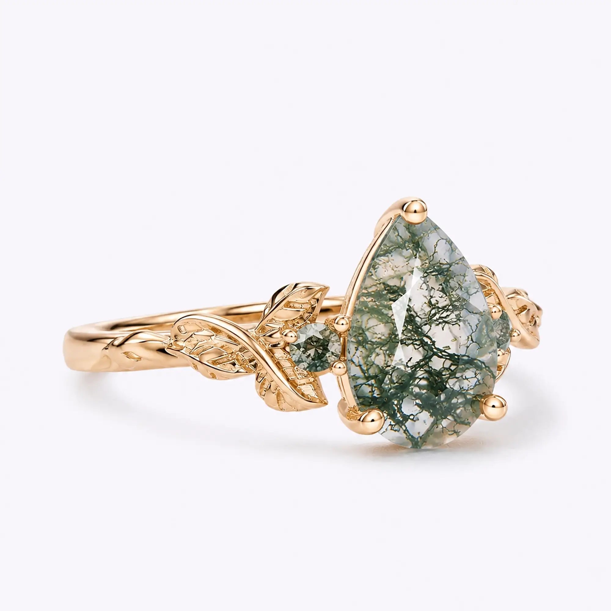 Side view of moss agate leaf ring showing vine-inspired gold band design