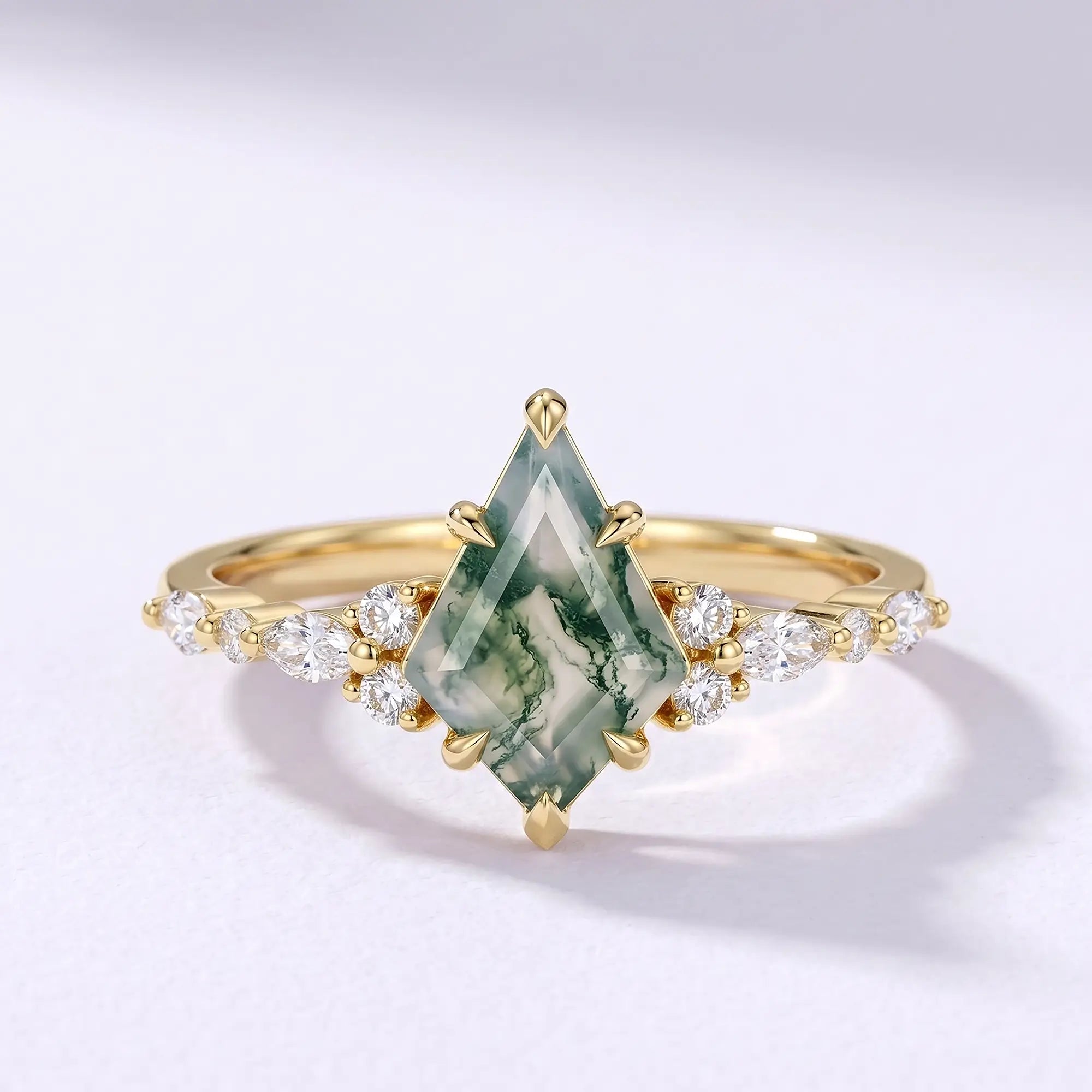 Handcrafted elegant kite-cut natural moss agate cluster engagement ring with marquise and round moissanite accents in solid yellow gold by Orleone