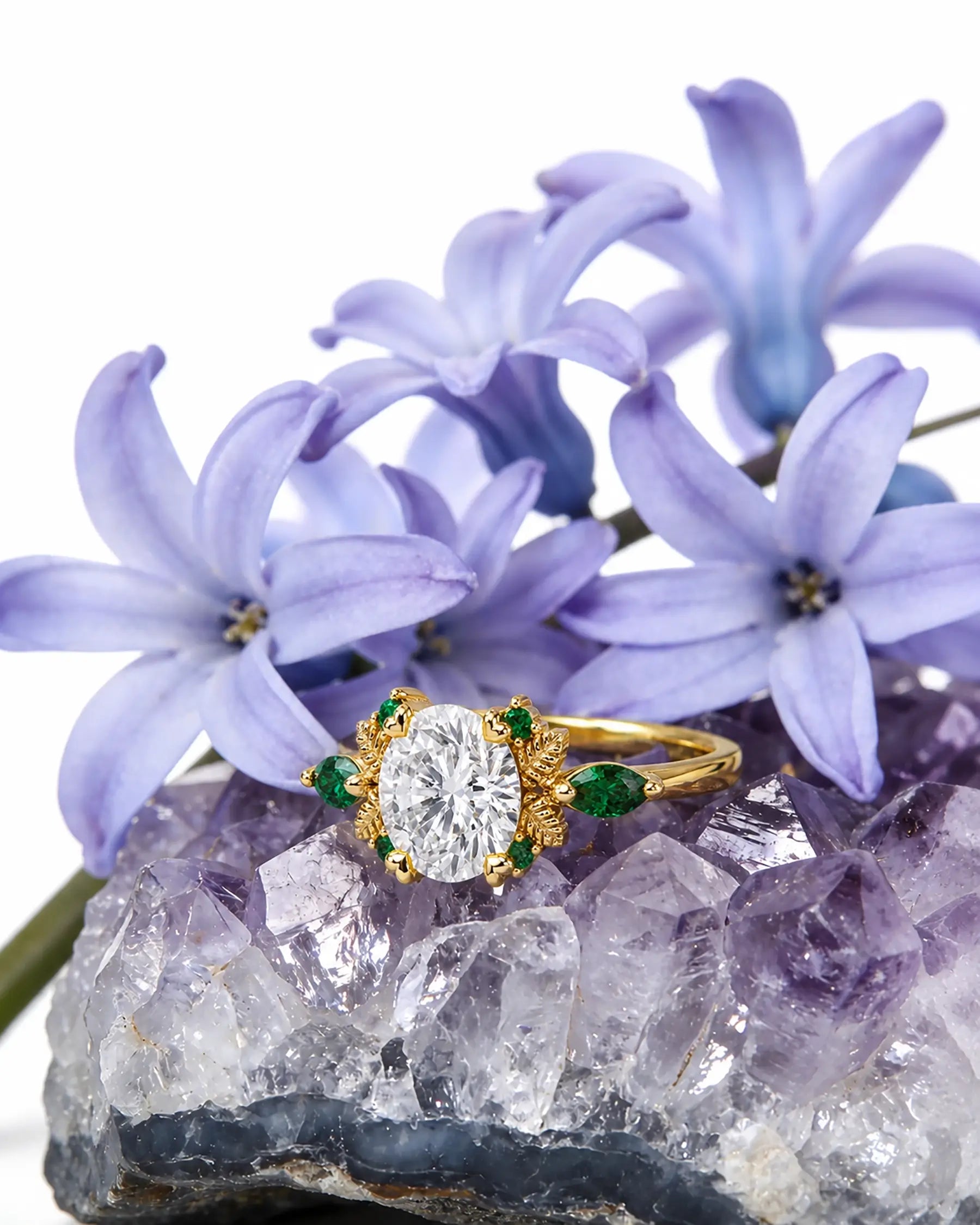 Nature-inspired moissanite leaf ring styled in an elegant jewelry scene