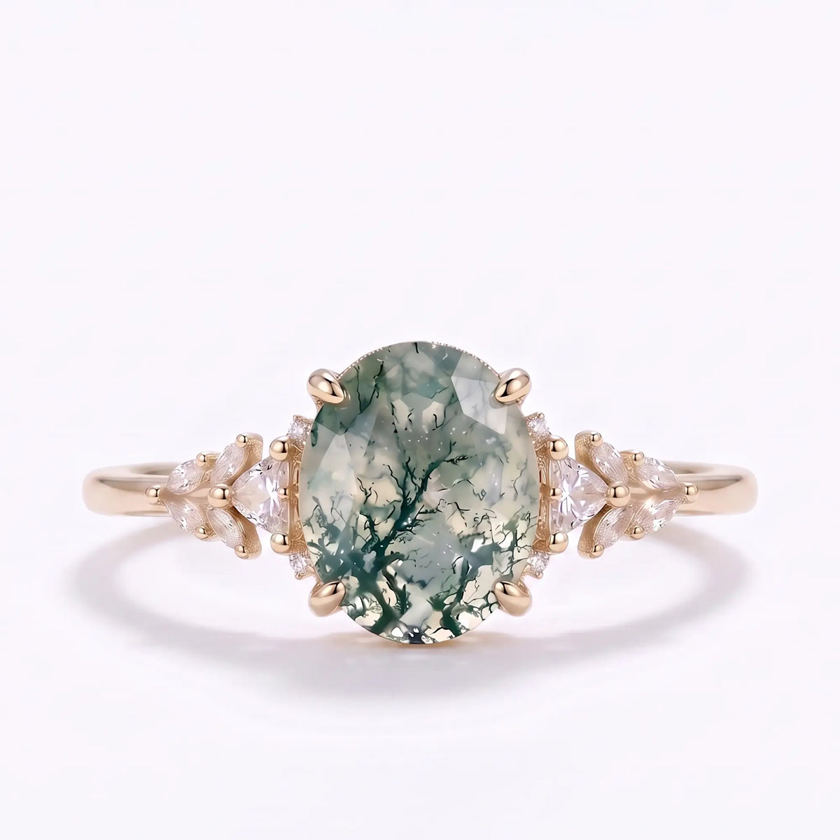 Oval moss agate cluster engagement ring with mixed-cut moissanite accents in rose gold
