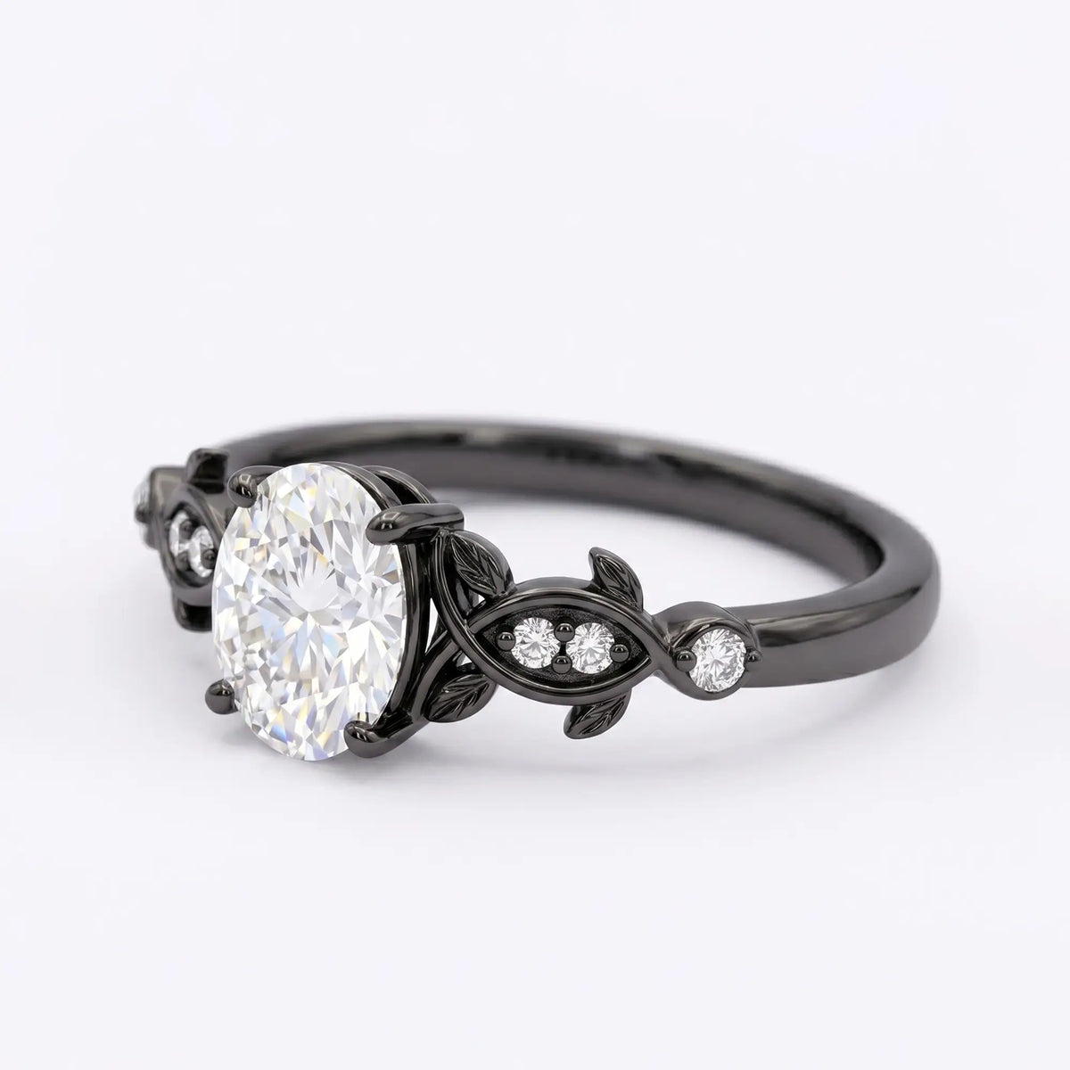 Side view profile of alternative bridal black gold ring highlighting the detailed low-profile leaf filigree